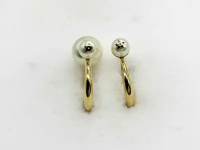 pearl earrings (one earring missing a pearl)