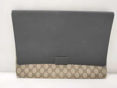 GG Supreme Gucci GG pattern clutch bag, black clutch bag