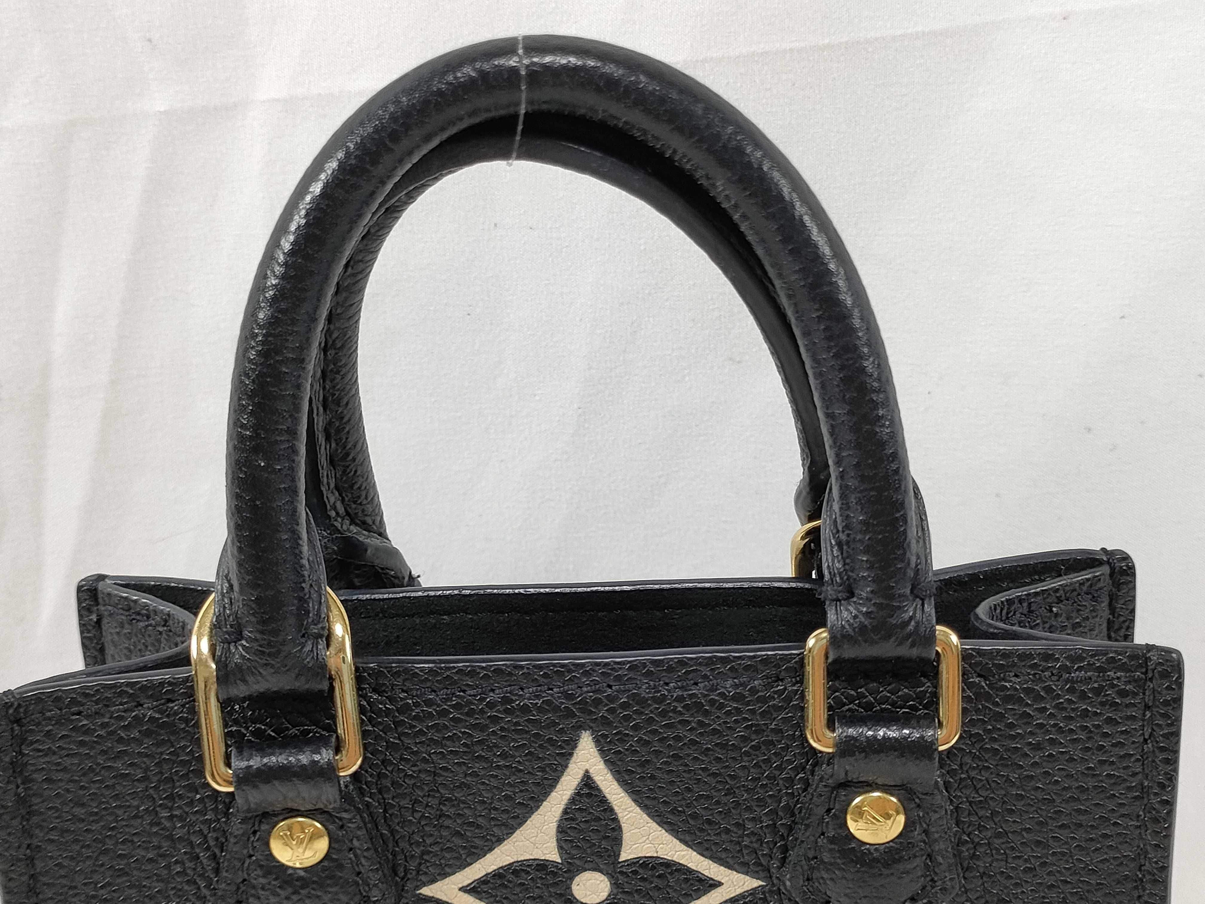 Petite Sac Plat Monogram Empreinte Handbag — view 3