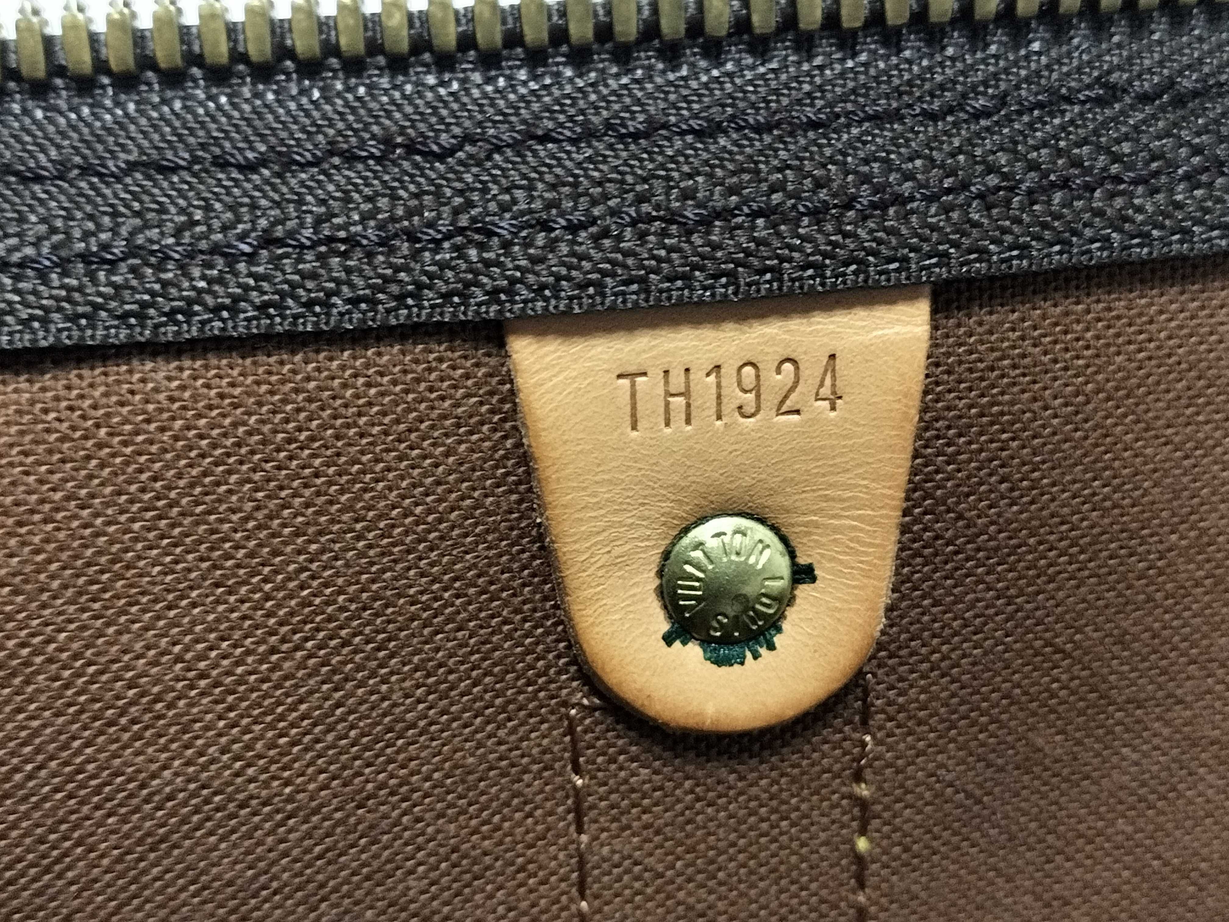 LV Keepall Bandoulière 55 M41414 Monogram Boston Bag with Key, Padlock, Strap, Handle Strap, Name Tag, and Dust Bag — view 11