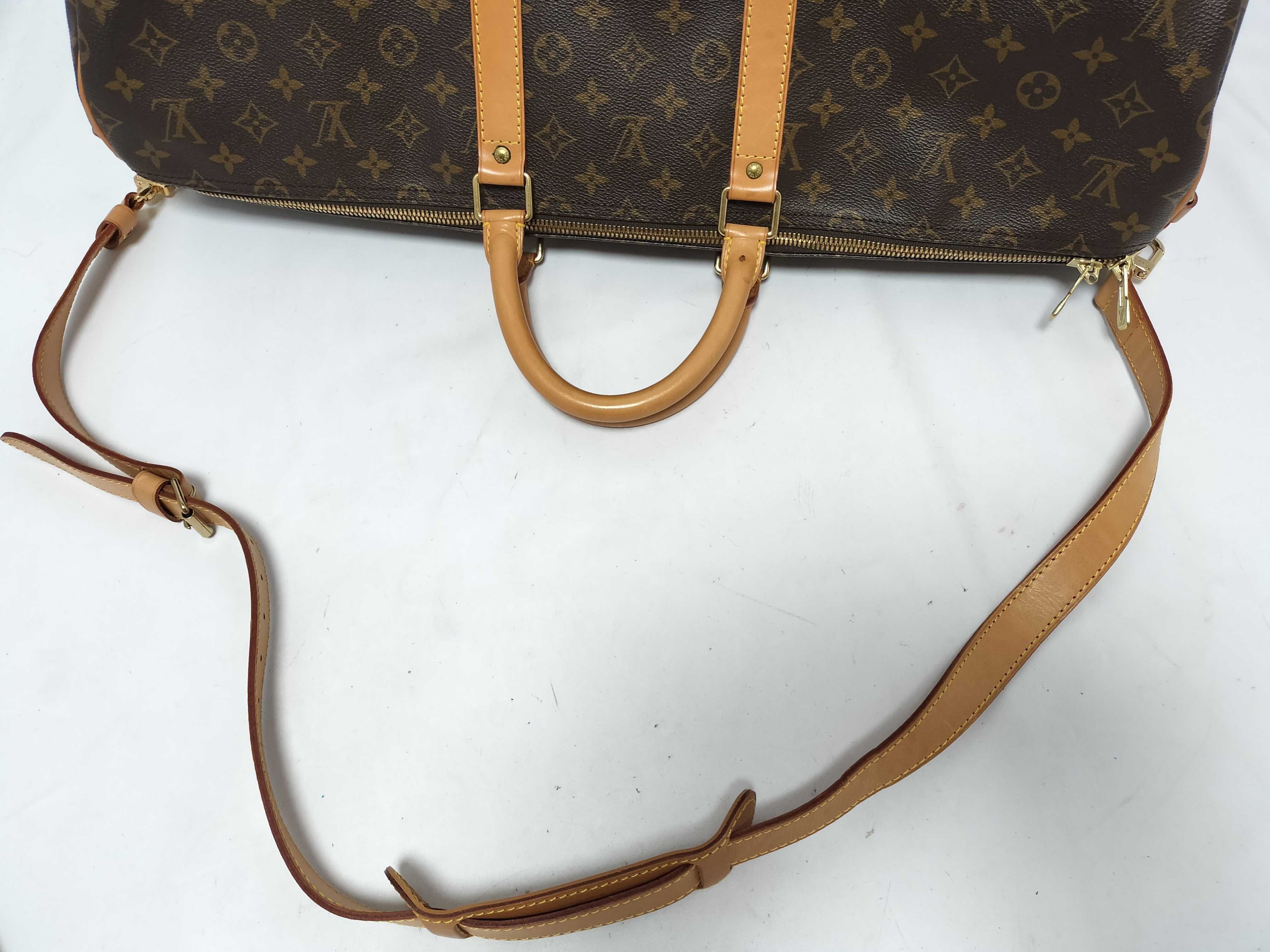 LV Keepall Bandoulière 55 M41414 Monogram Boston Bag with Key, Padlock, Strap, Handle Strap, Name Tag, and Dust Bag — view 4