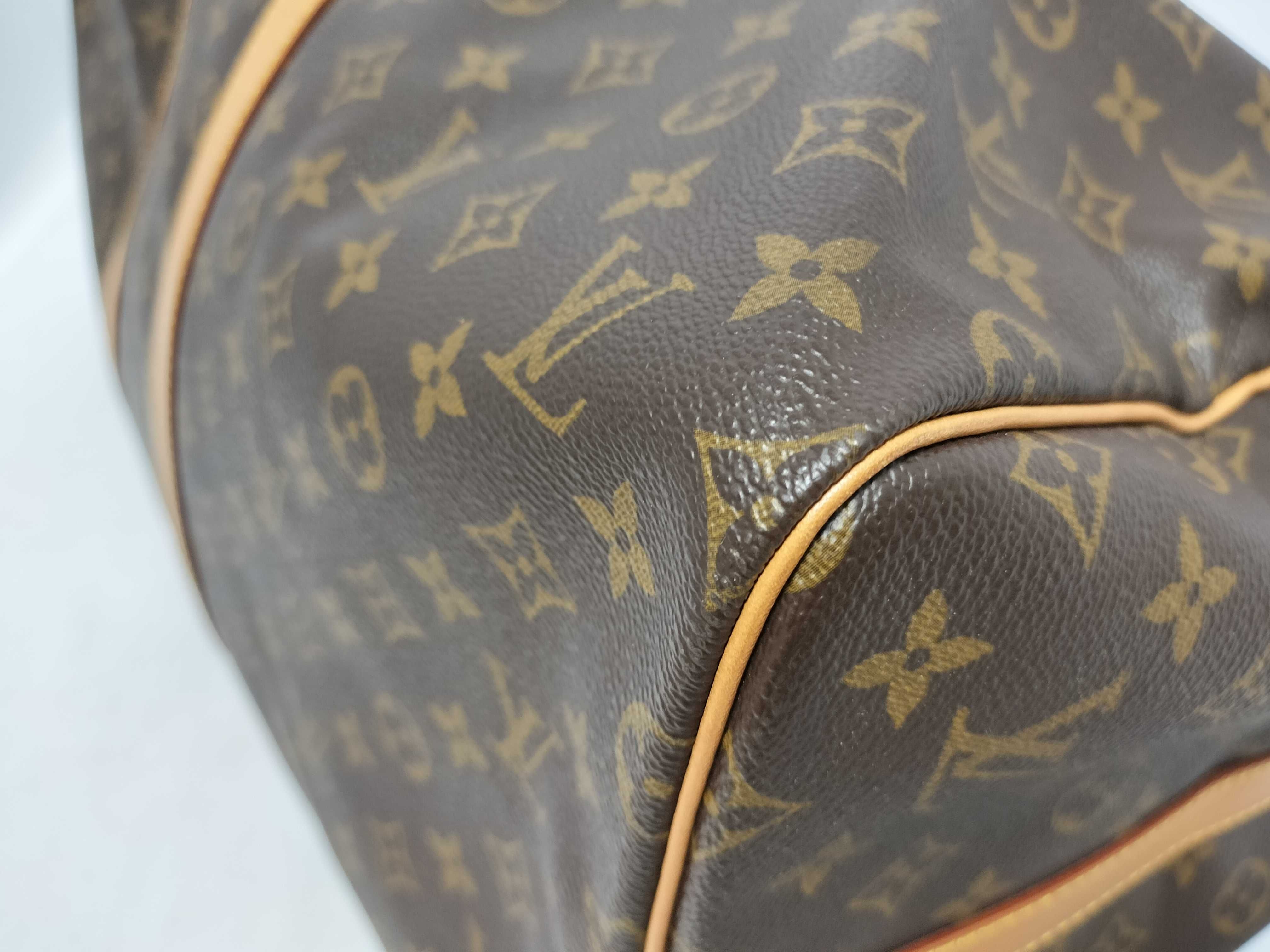 LV Keepall Bandoulière 55 M41414 Monogram Boston Bag with Key, Padlock, Strap, Handle Strap, Name Tag, and Dust Bag — view 9