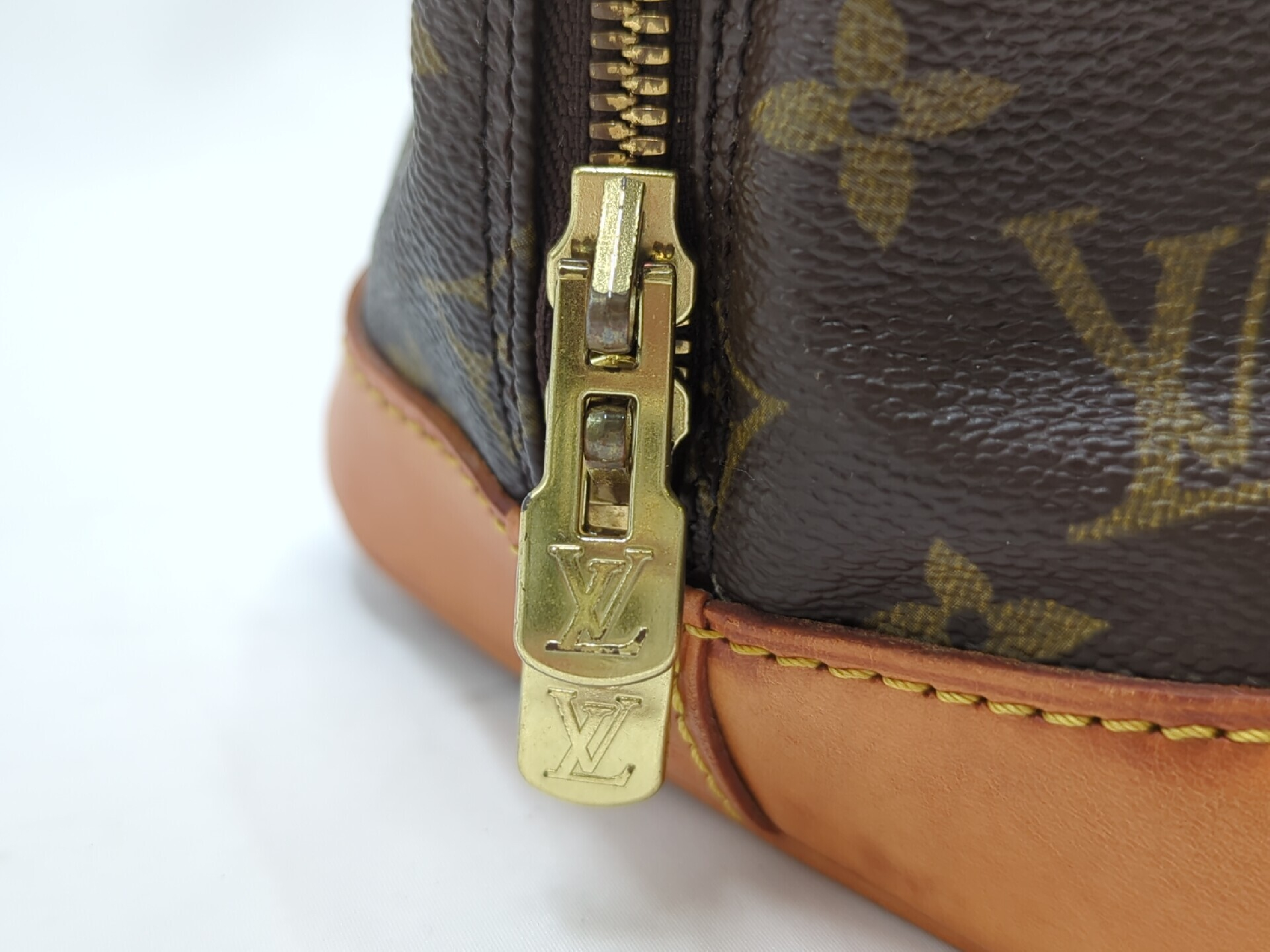 M51130 Monogram Alma PM Handbag — view 9