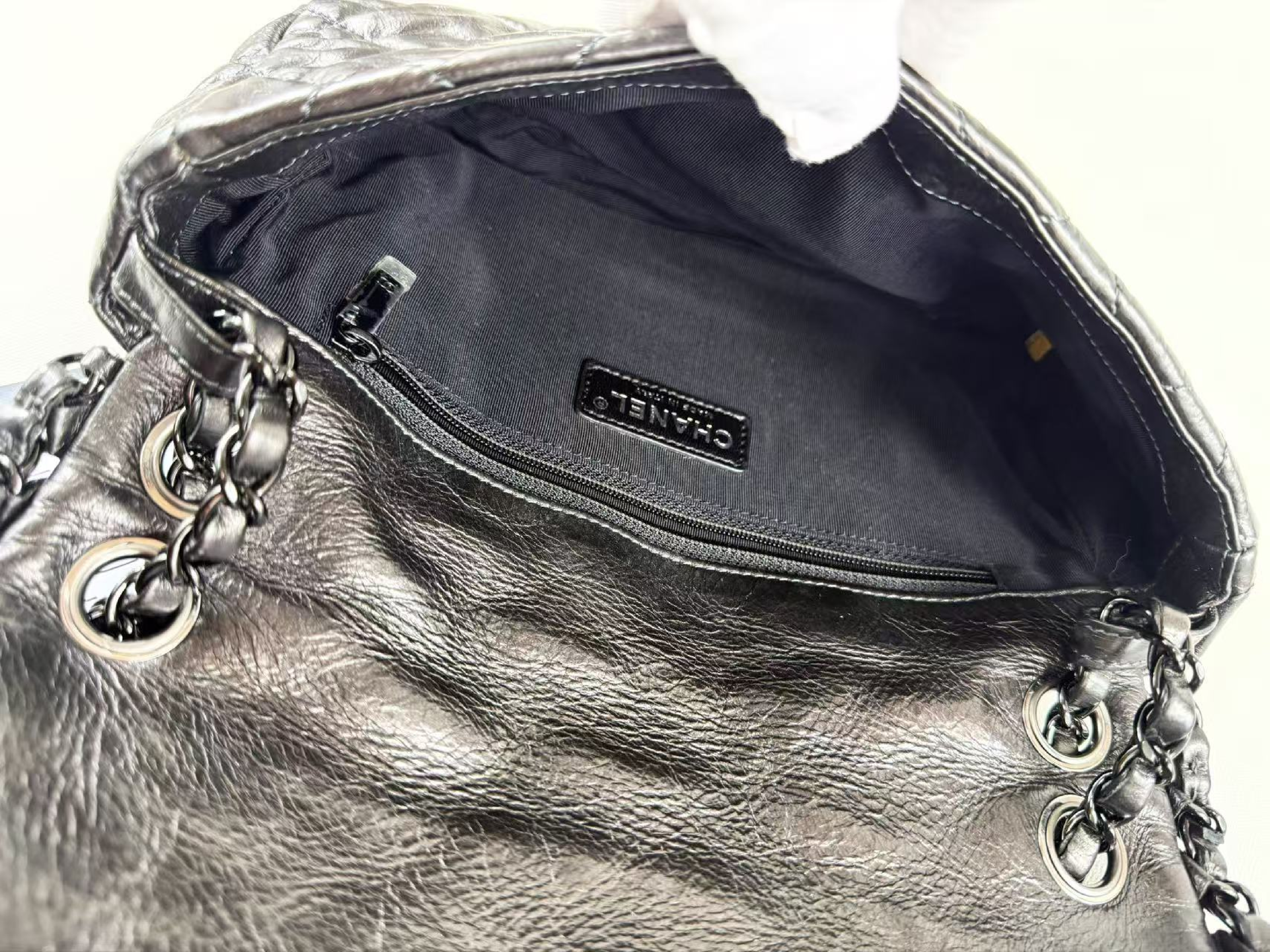 Matelassé black hardware chain-around shoulder bag, wrinkled finish, approximately W25cm, serial number in the 14 range. Includes dust bag and sticker. Item number 14767933. — view 15