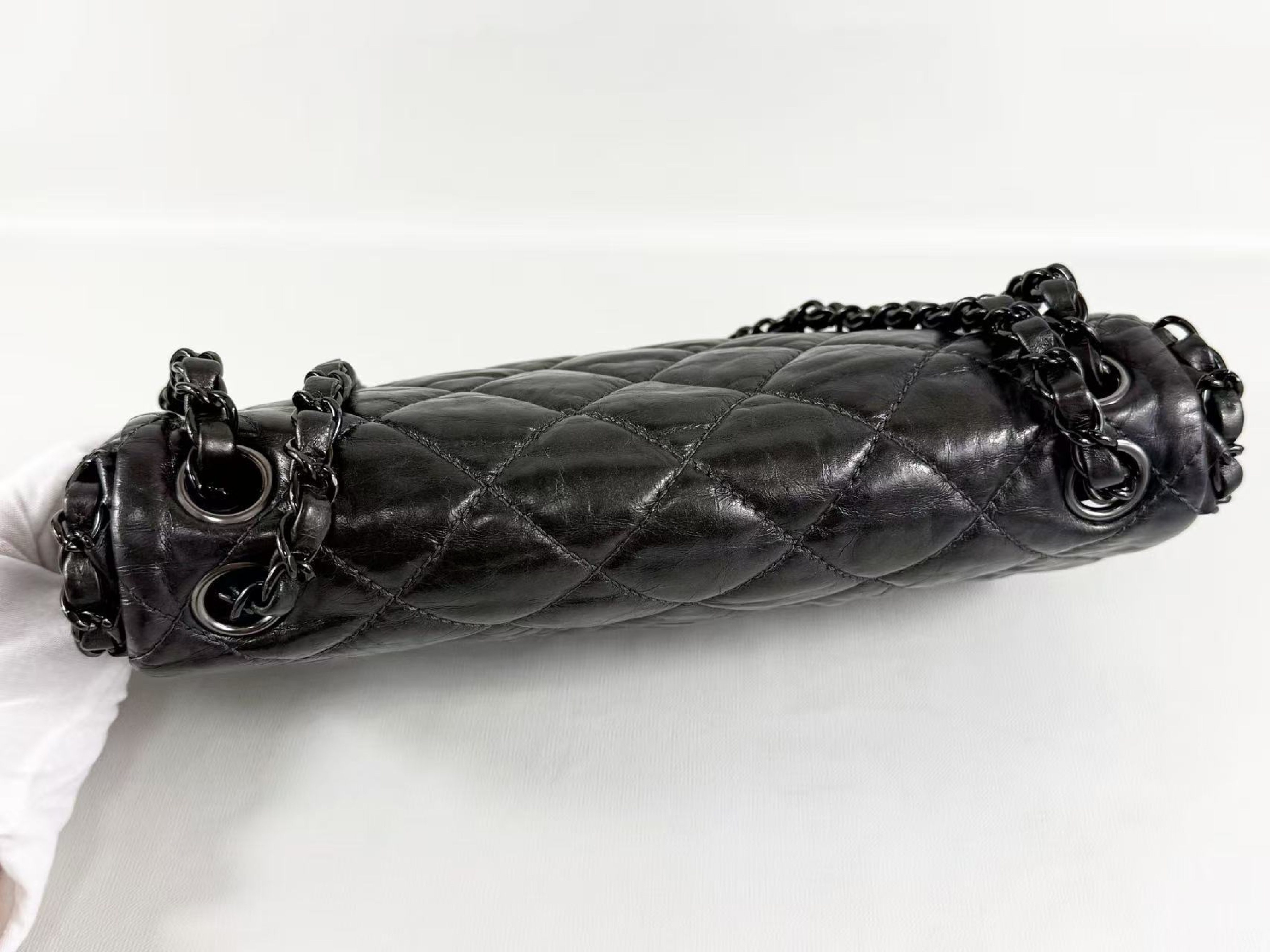 Matelassé black hardware chain-around shoulder bag, wrinkled finish, approximately W25cm, serial number in the 14 range. Includes dust bag and sticker. Item number 14767933. — view 7