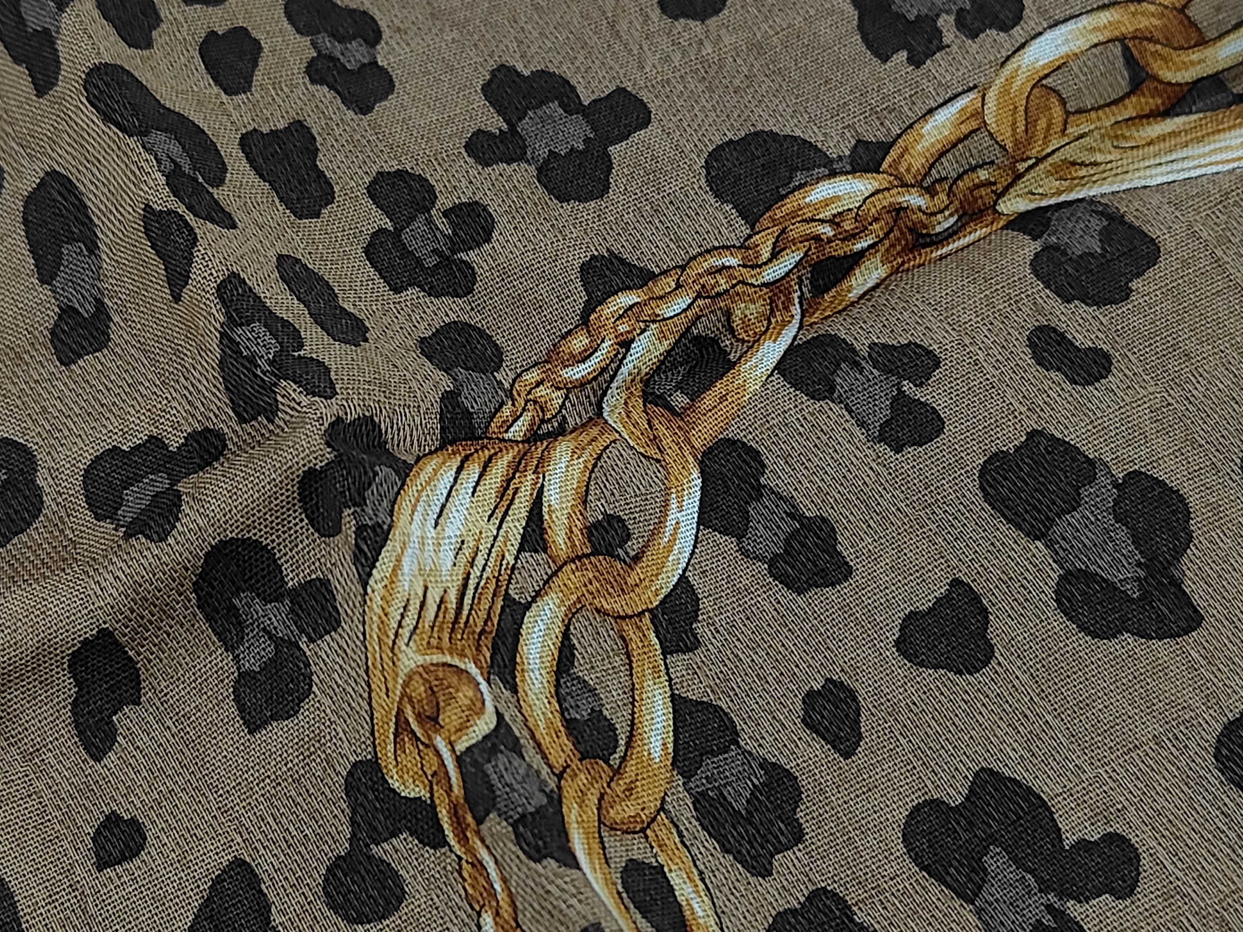handkerchief scarf with sticker, logo border, leopard print, chain, and other accessories. — view 5