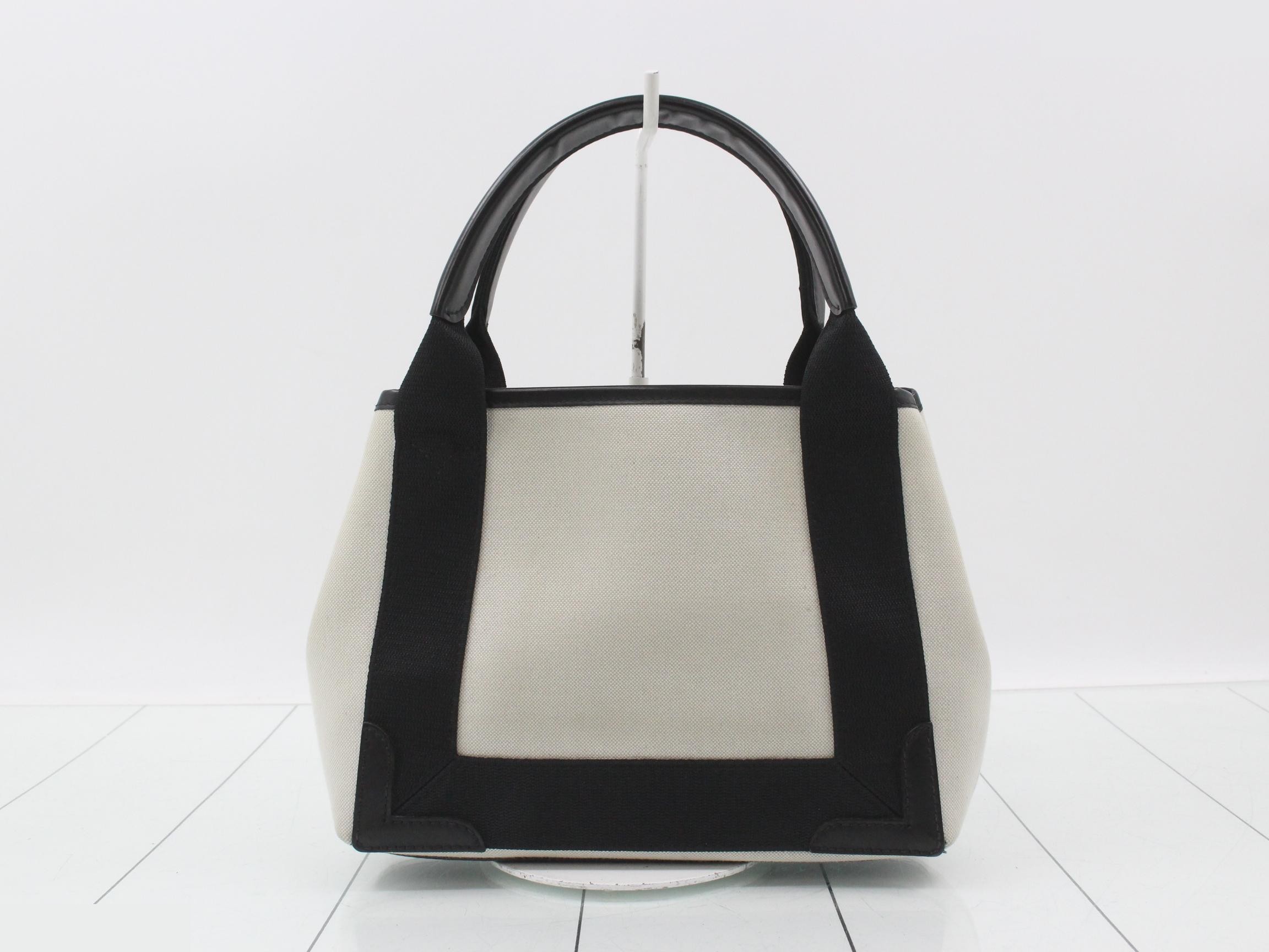 Cabas handbag, size S, with shoulder strap, pouch, and dust bag. — view 2