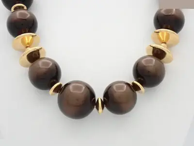 Other lines: Precious metal necklace, ball design, brown, chain approximately 50cm.