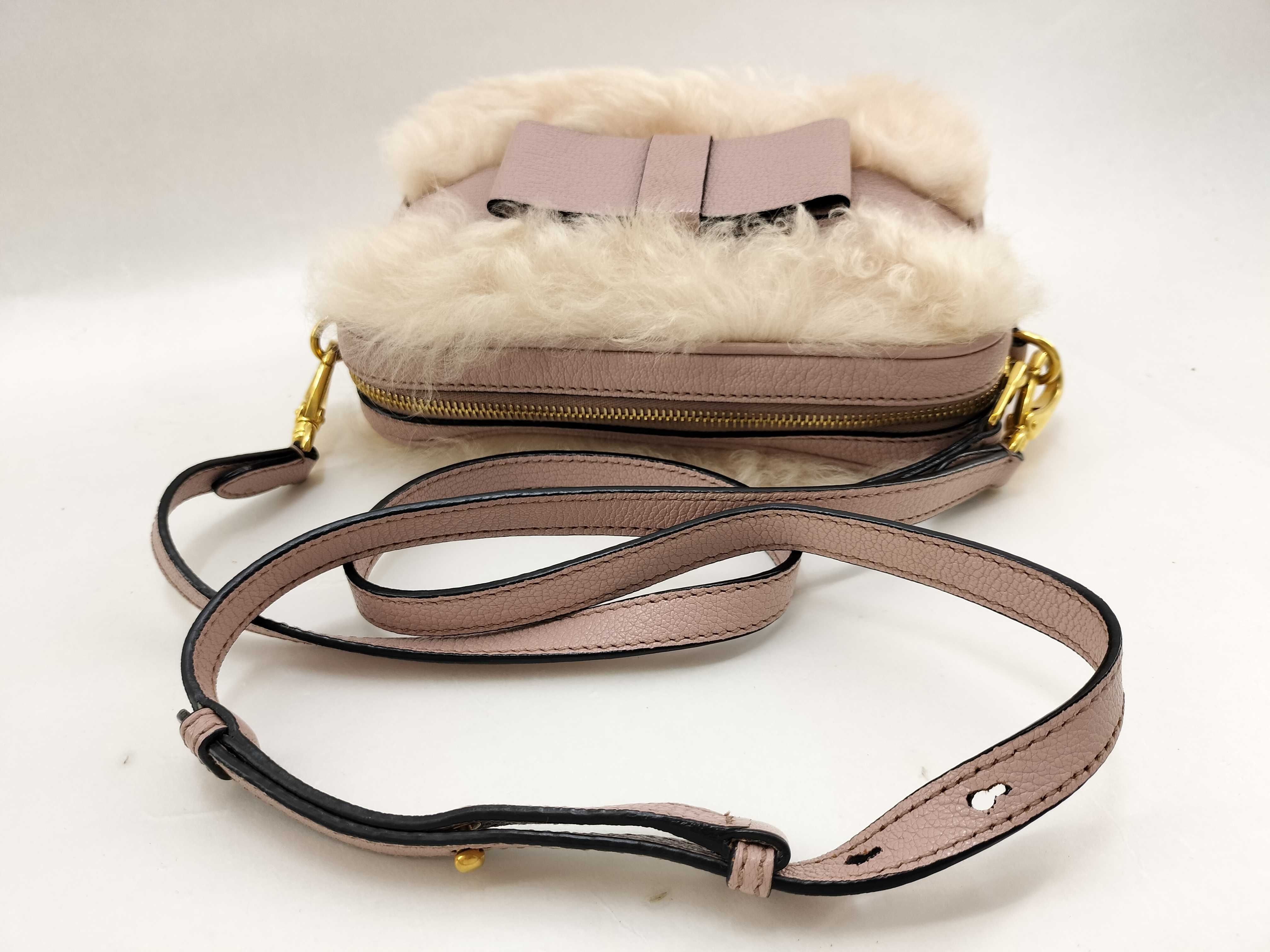 shoulder bag (5BH082) with fur trim, leather accents, ribbon detail, gold hardware, and satin lining. Includes guarantee card and dust bag. — view 10