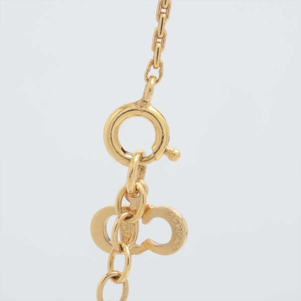 CD logo necklace, gold plated with rhinestones. Shows signs of wear, — view 3