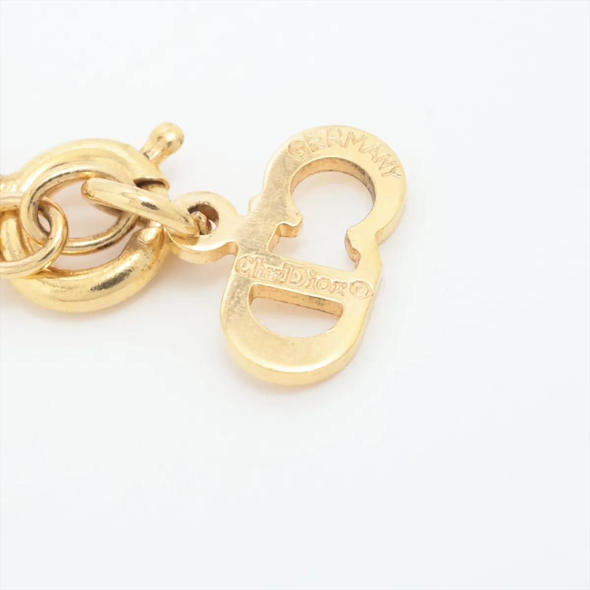 CD logo necklace, gold plated with rhinestones. Shows signs of wear, — view 4