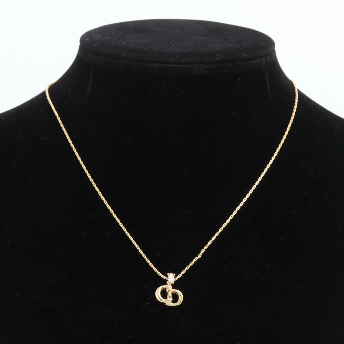 CD logo necklace, gold plated with rhinestones. Shows signs of wear, — view 5