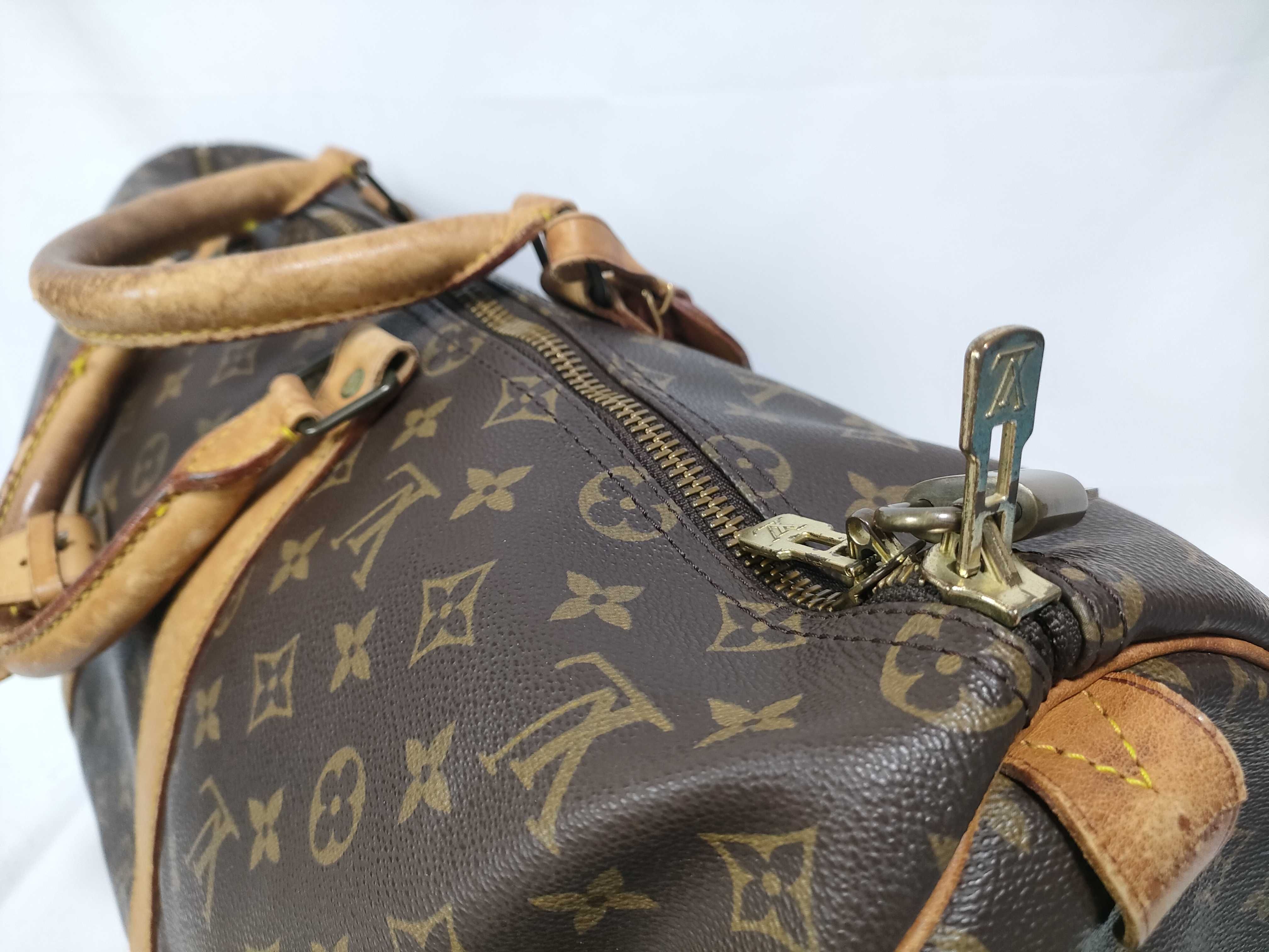 Monogram Leather Boston Bag — view 10