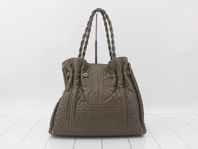 Leather quilted twist tote bag