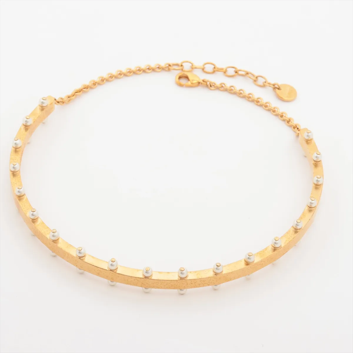 choker, gold-plated with faux pearls. Shows signs of wear, including