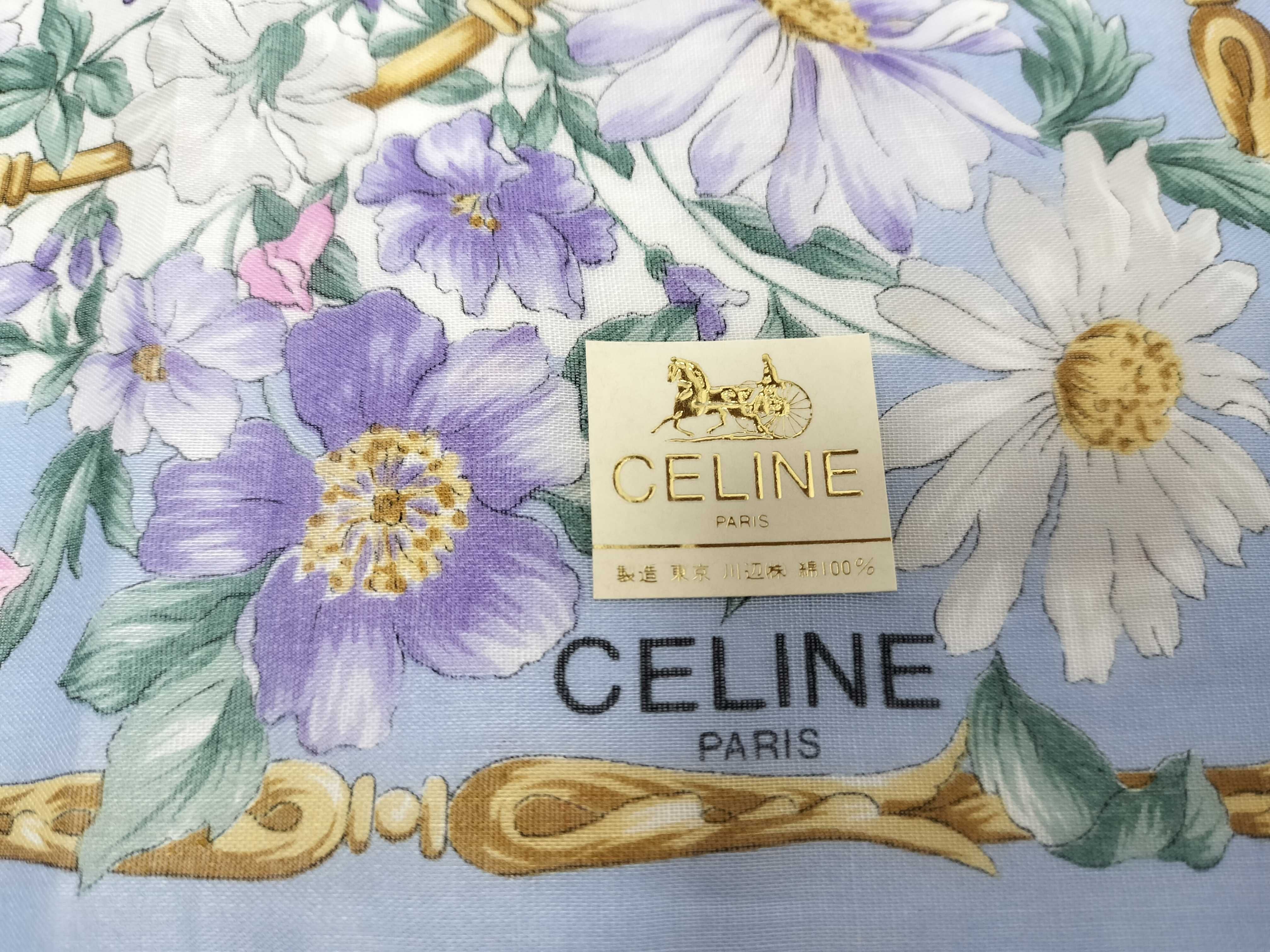 handkerchief scarf with sticker, floral design, and other accessories. — view 3