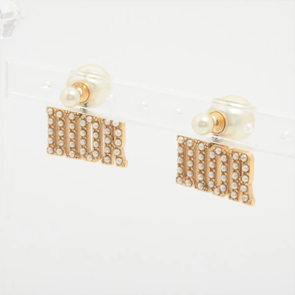 Tribales earrings (for both ears), gold-plated with faux pearls. Shows signs of wear including — view 3