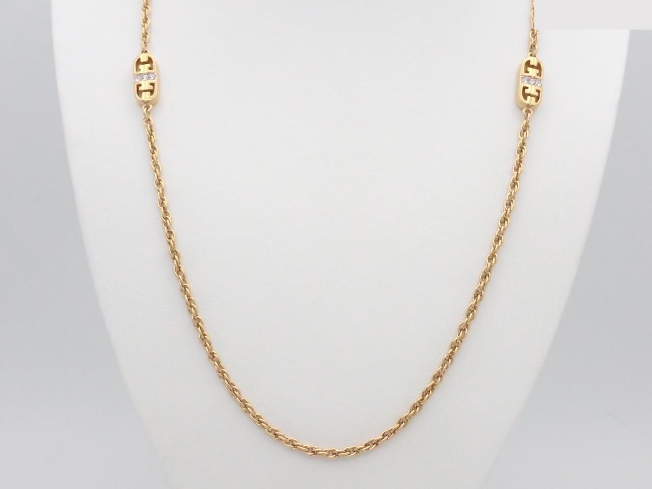 necklace, gold, cubic zirconia, approximately 80cm in length.