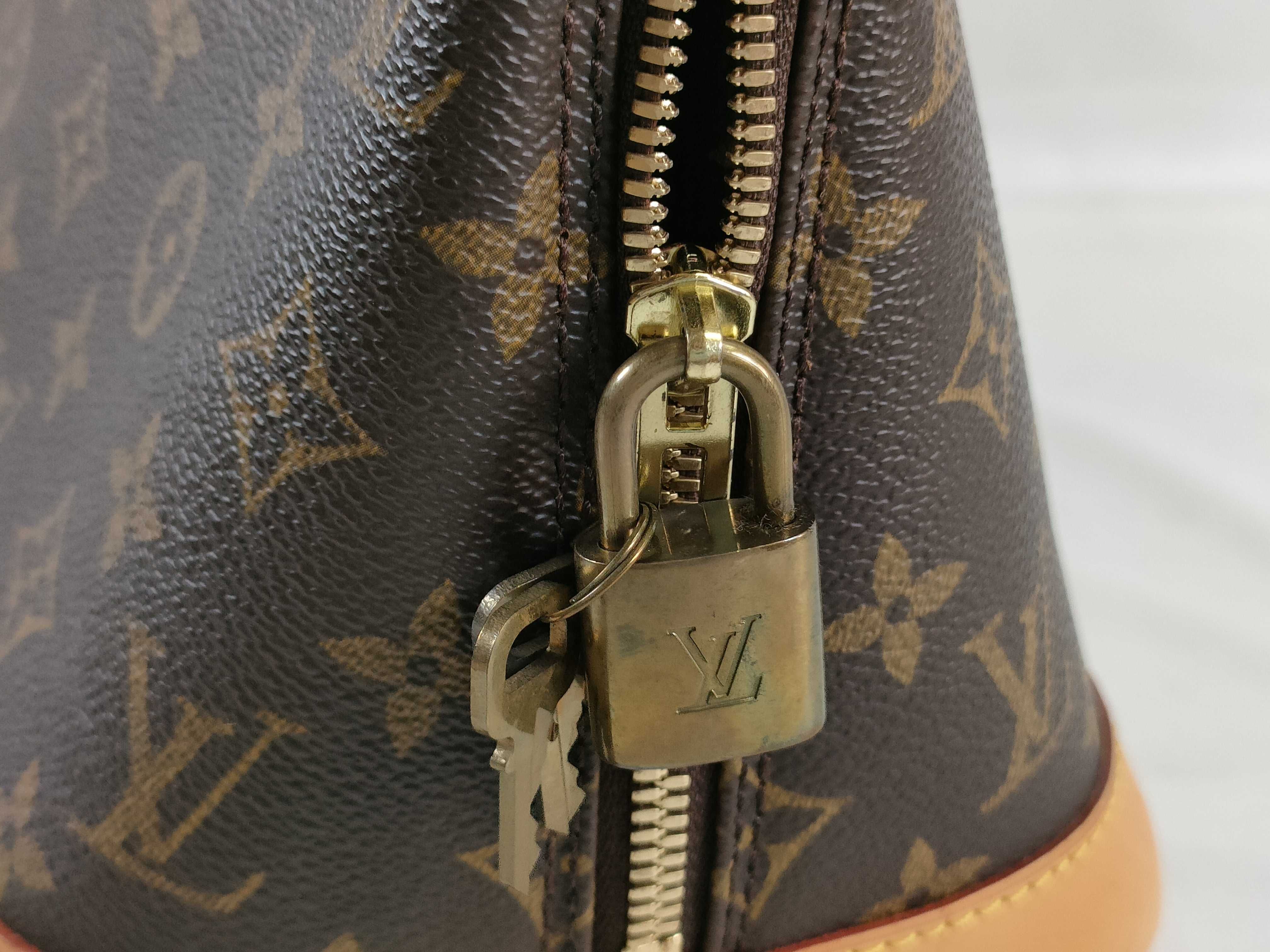 Monogram Alma M51130 Brown FL0023 Handbag — view 14