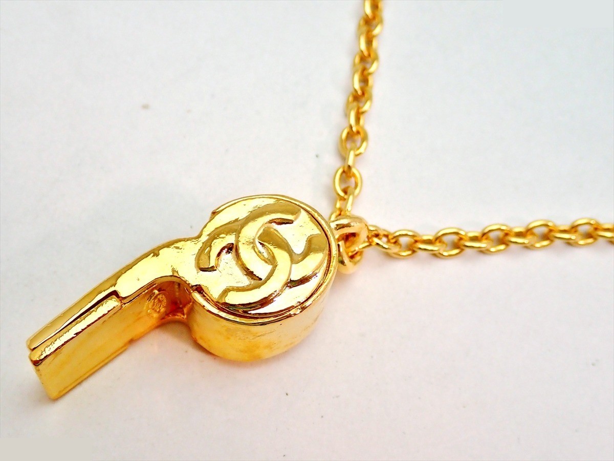 Marked 95P whistle, chain approximately 64cm