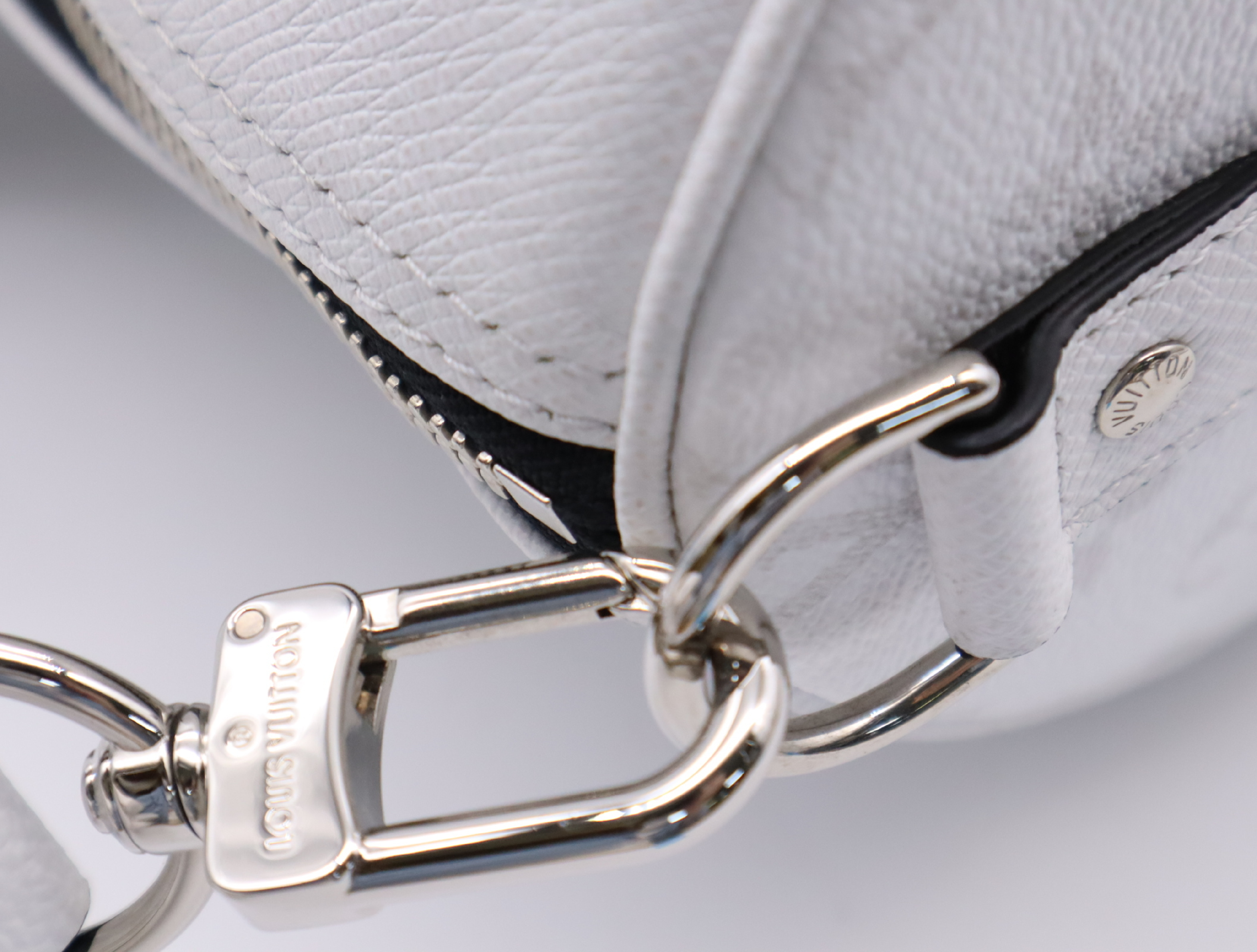 M27792 Taigarama Keepall Bandoulière 50 Boston Bag with Shoulder Strap, Padlock, 2 Keys, Name Tag, Handle Strap, Dust Bag, and Small Dust Bag. — view 11