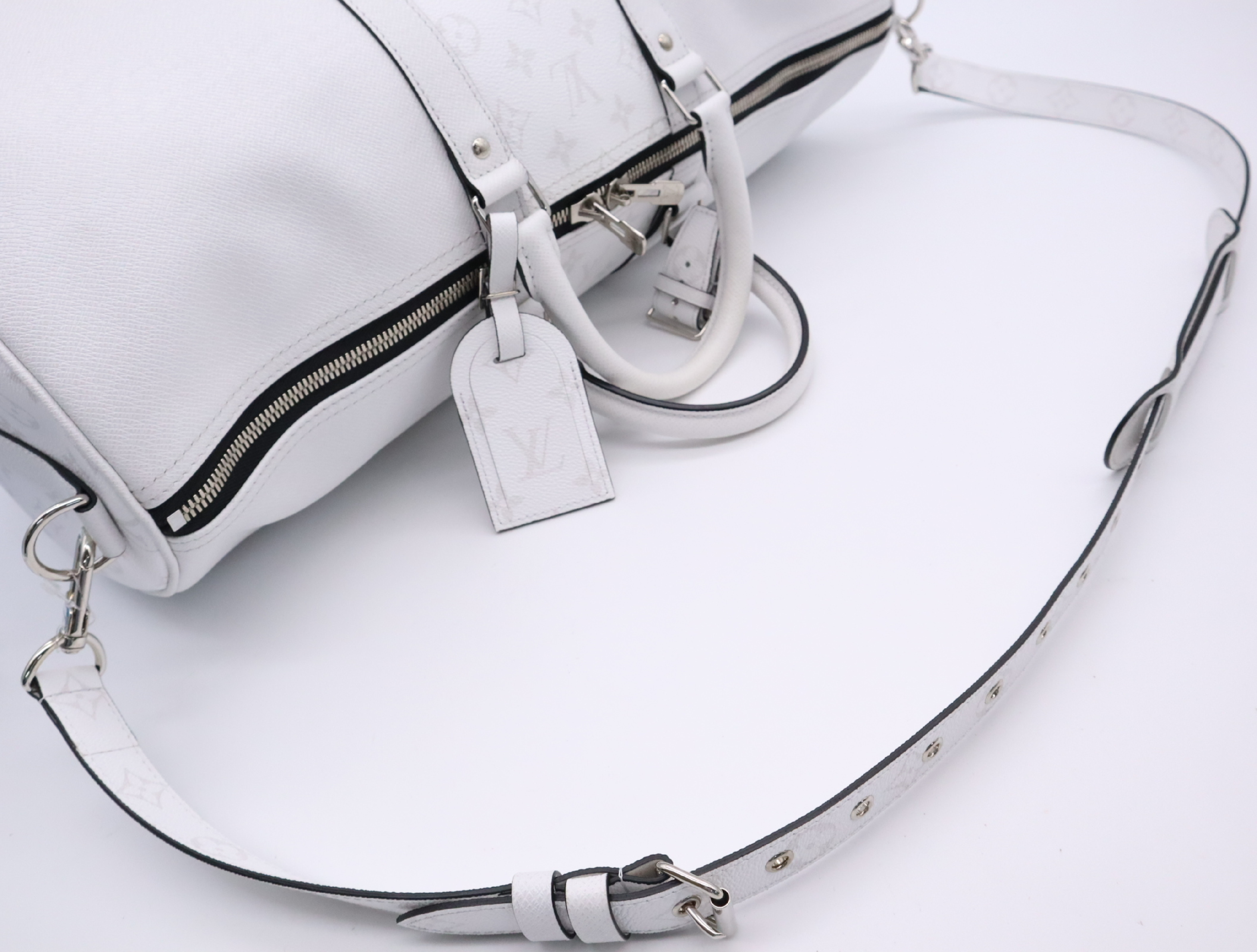 M27792 Taigarama Keepall Bandoulière 50 Boston Bag with Shoulder Strap, Padlock, 2 Keys, Name Tag, Handle Strap, Dust Bag, and Small Dust Bag. — view 12