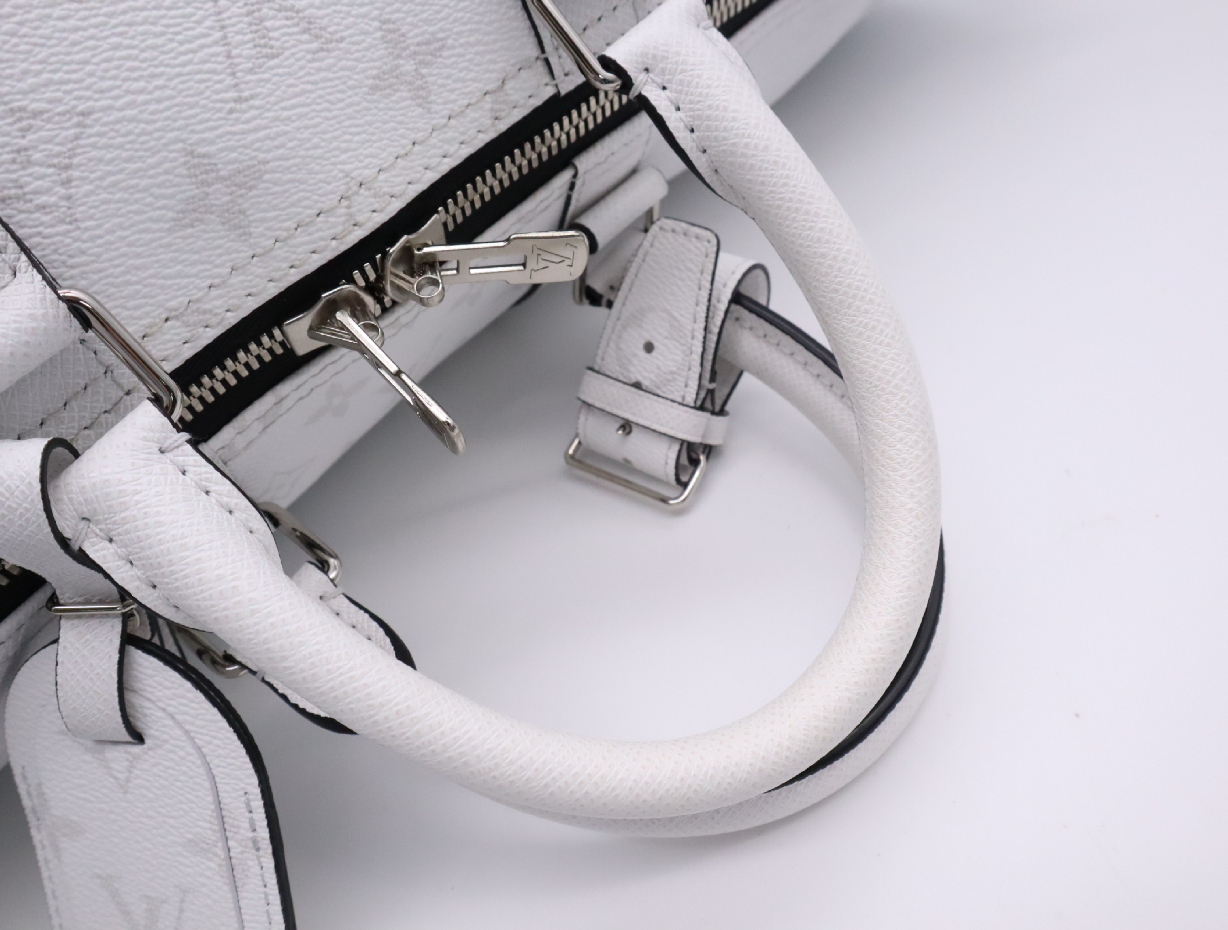 M27792 Taigarama Keepall Bandoulière 50 Boston Bag with Shoulder Strap, Padlock, 2 Keys, Name Tag, Handle Strap, Dust Bag, and Small Dust Bag. — view 13