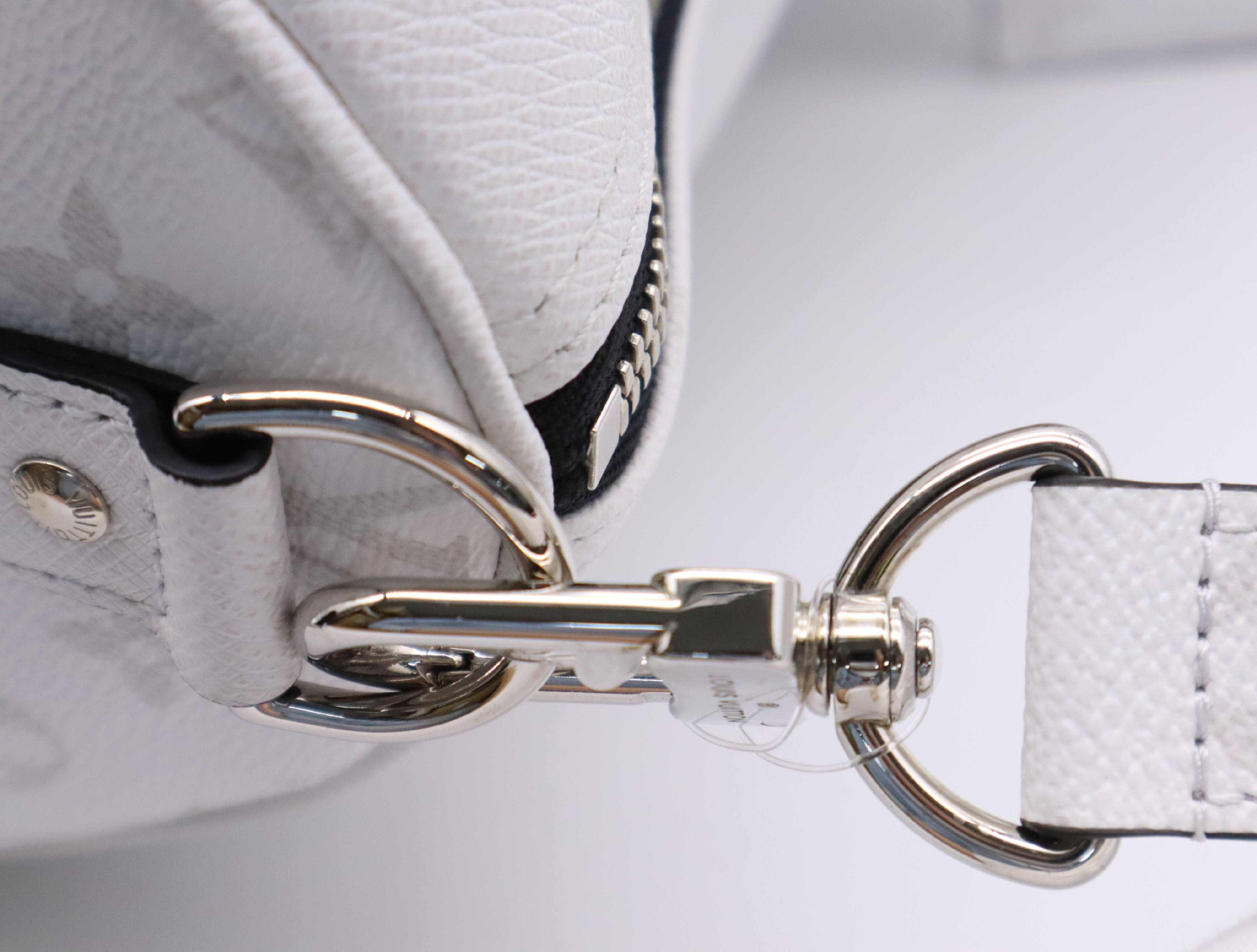 M27792 Taigarama Keepall Bandoulière 50 Boston Bag with Shoulder Strap, Padlock, 2 Keys, Name Tag, Handle Strap, Dust Bag, and Small Dust Bag. — view 8