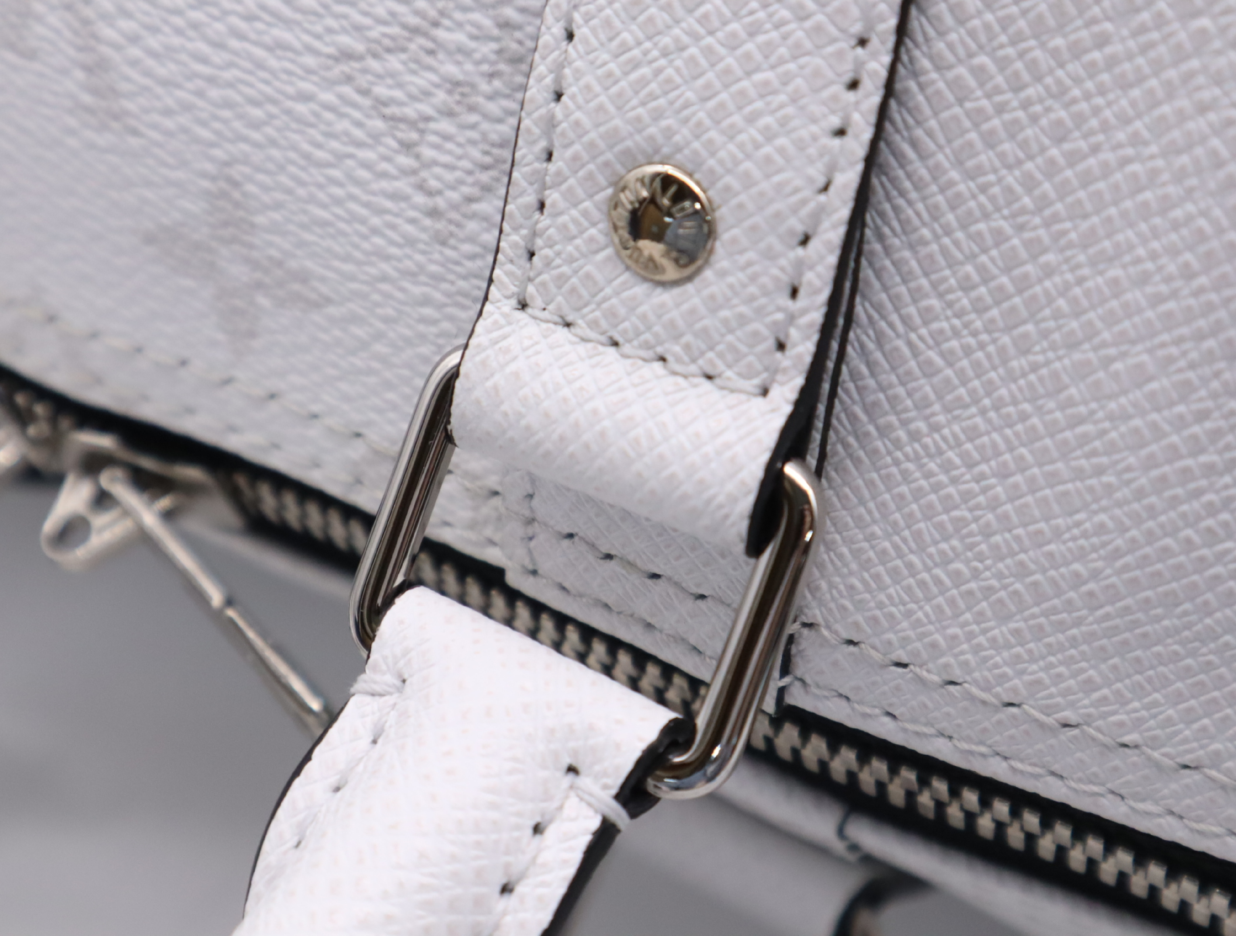 M27792 Taigarama Keepall Bandoulière 50 Boston Bag with Shoulder Strap, Padlock, 2 Keys, Name Tag, Handle Strap, Dust Bag, and Small Dust Bag. — view 10