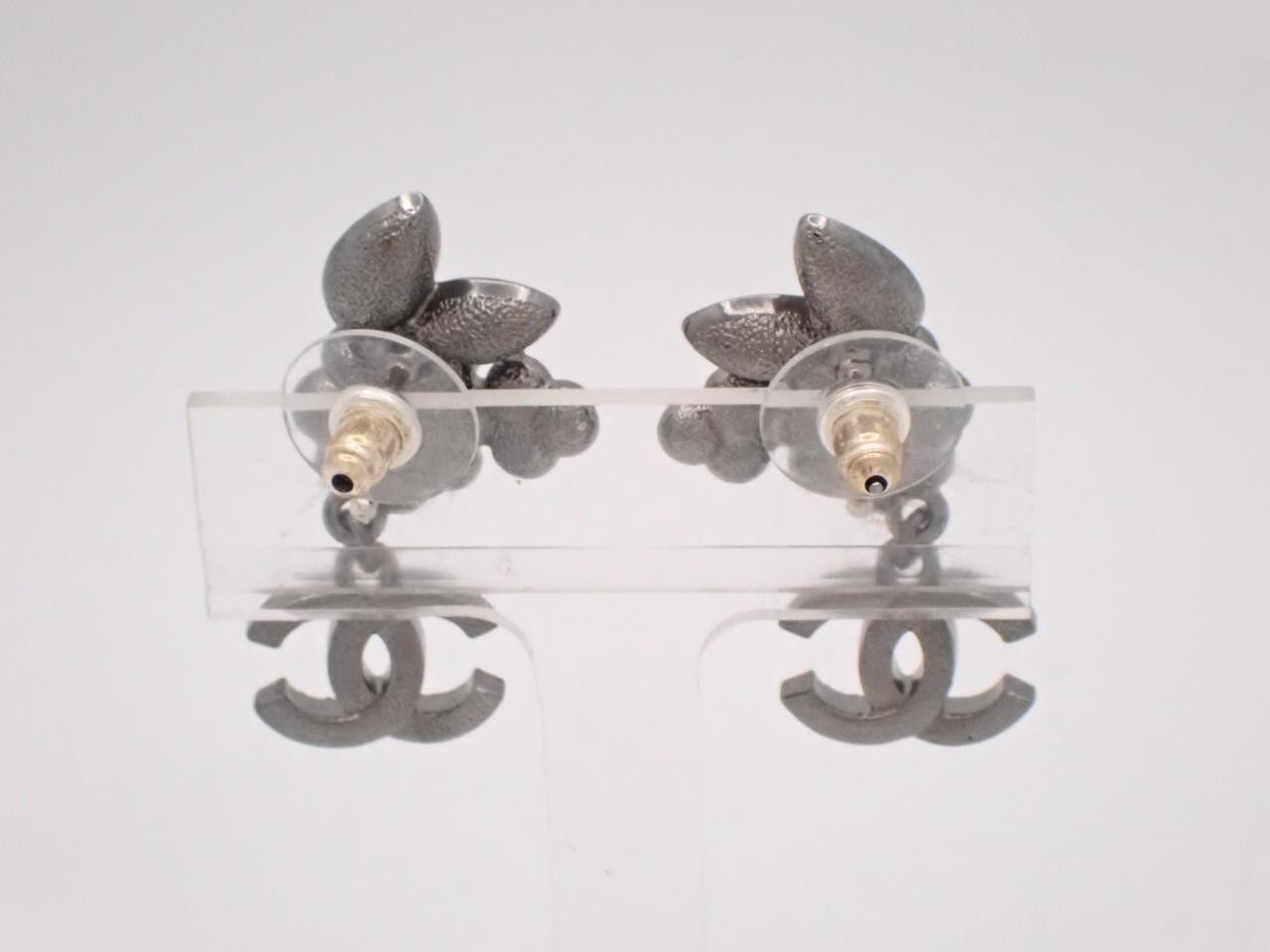 Flower, leaf, pearl, and Coco Mark earrings — view 2