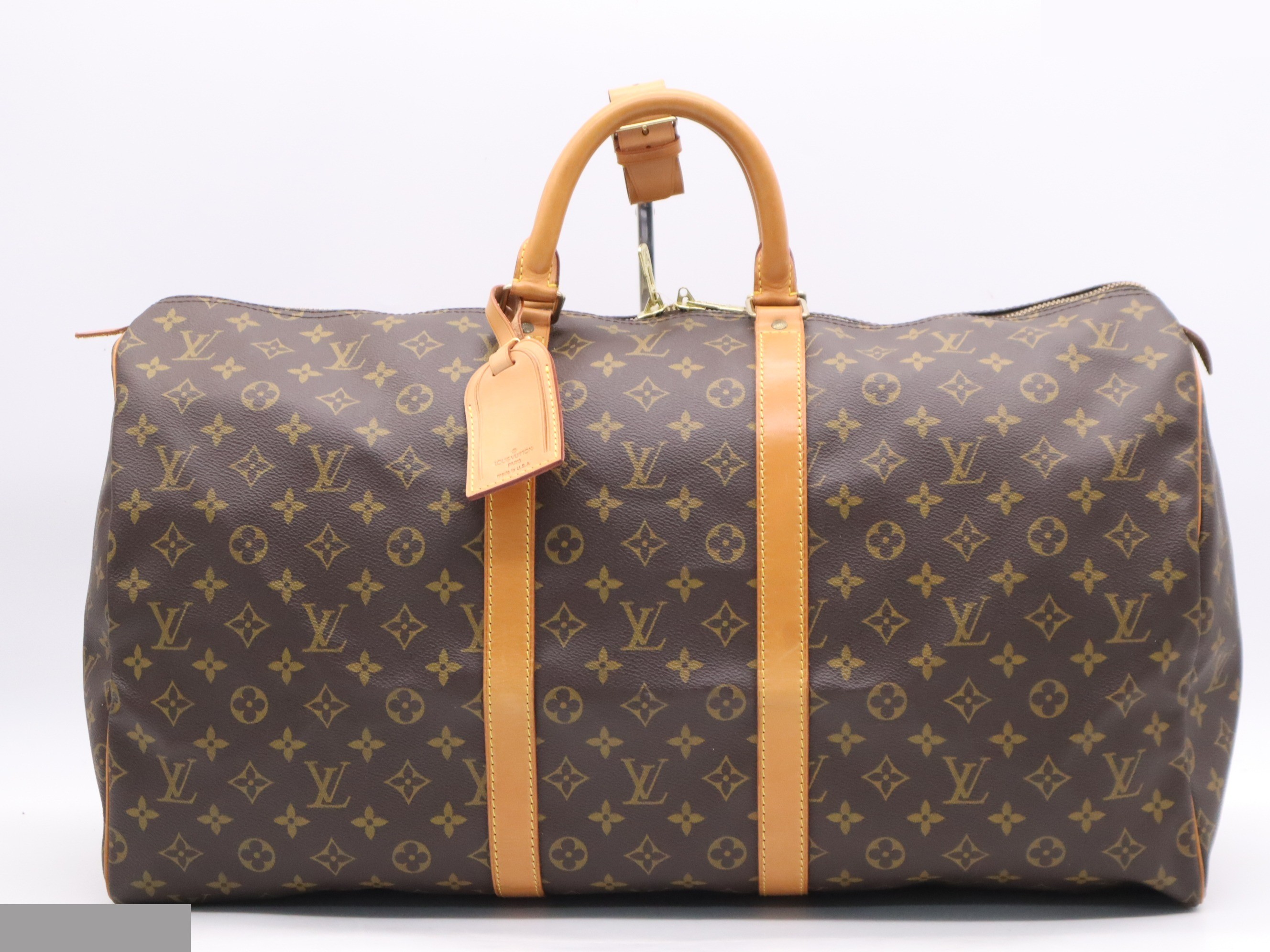 Keepall 55 with name tag and handle strap.