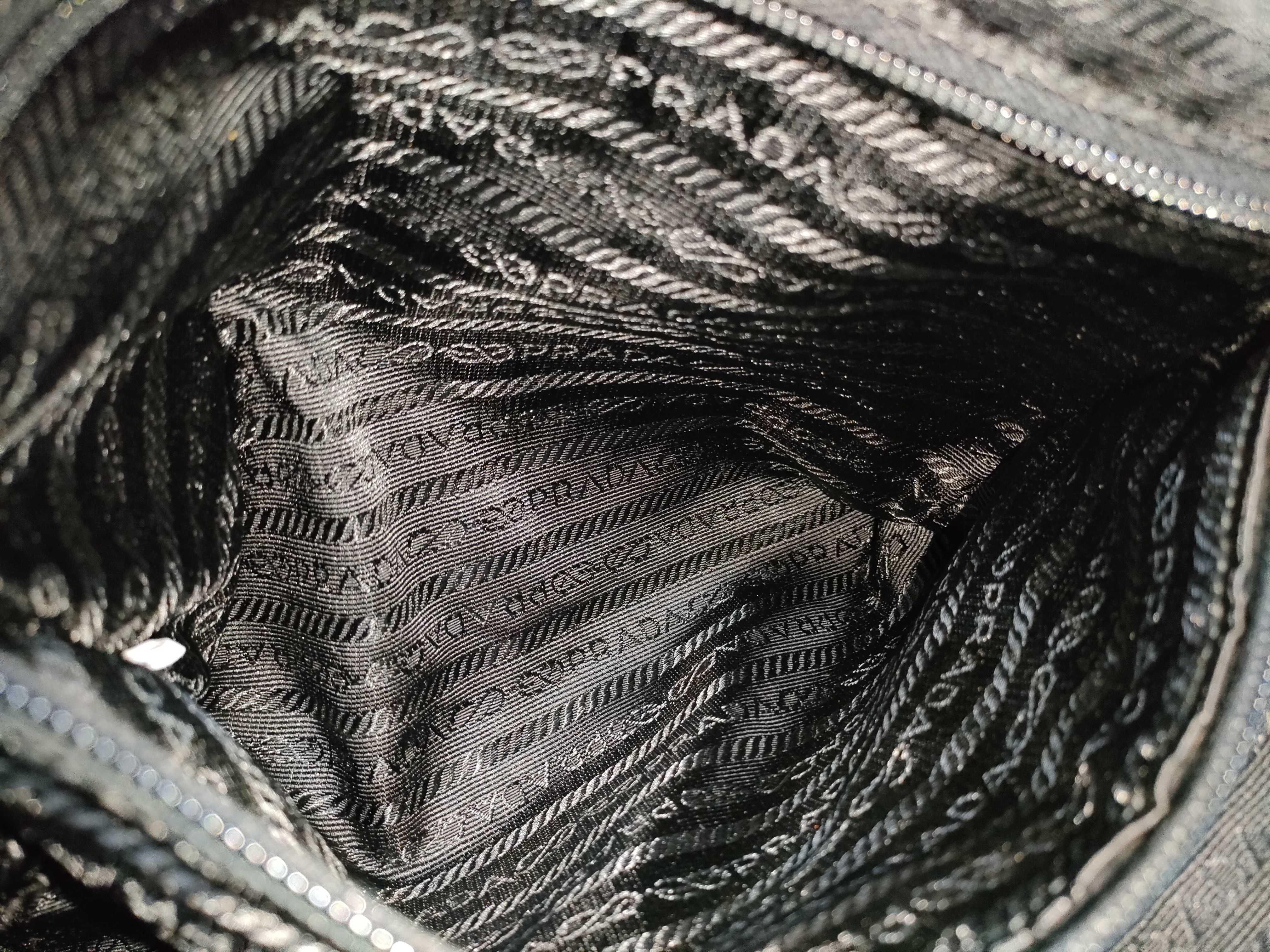 nylon handbag, black nylon, with clochette, guarantee card, and padlock. — view 11