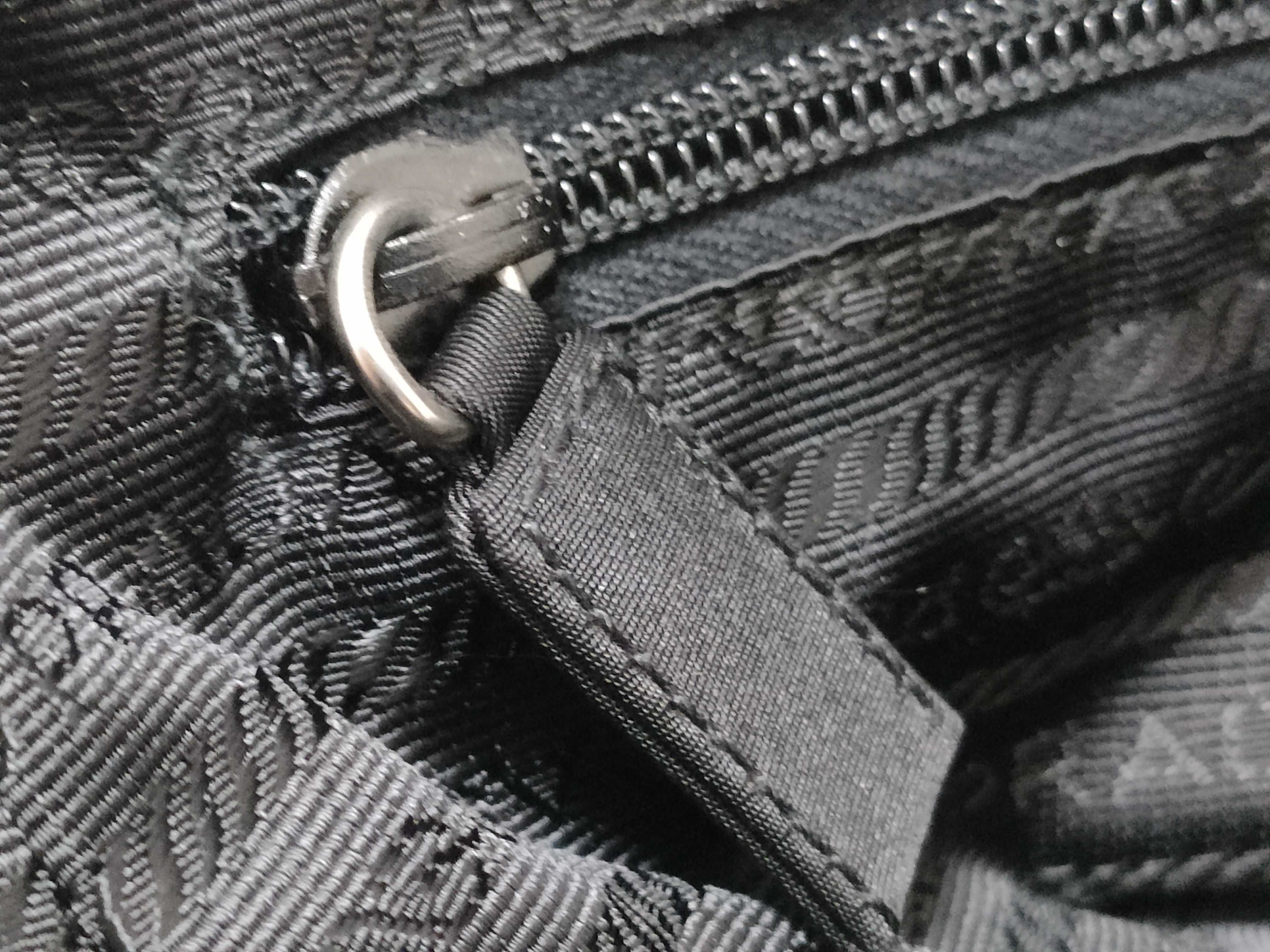 nylon handbag, black nylon, with clochette, guarantee card, and padlock. — view 13