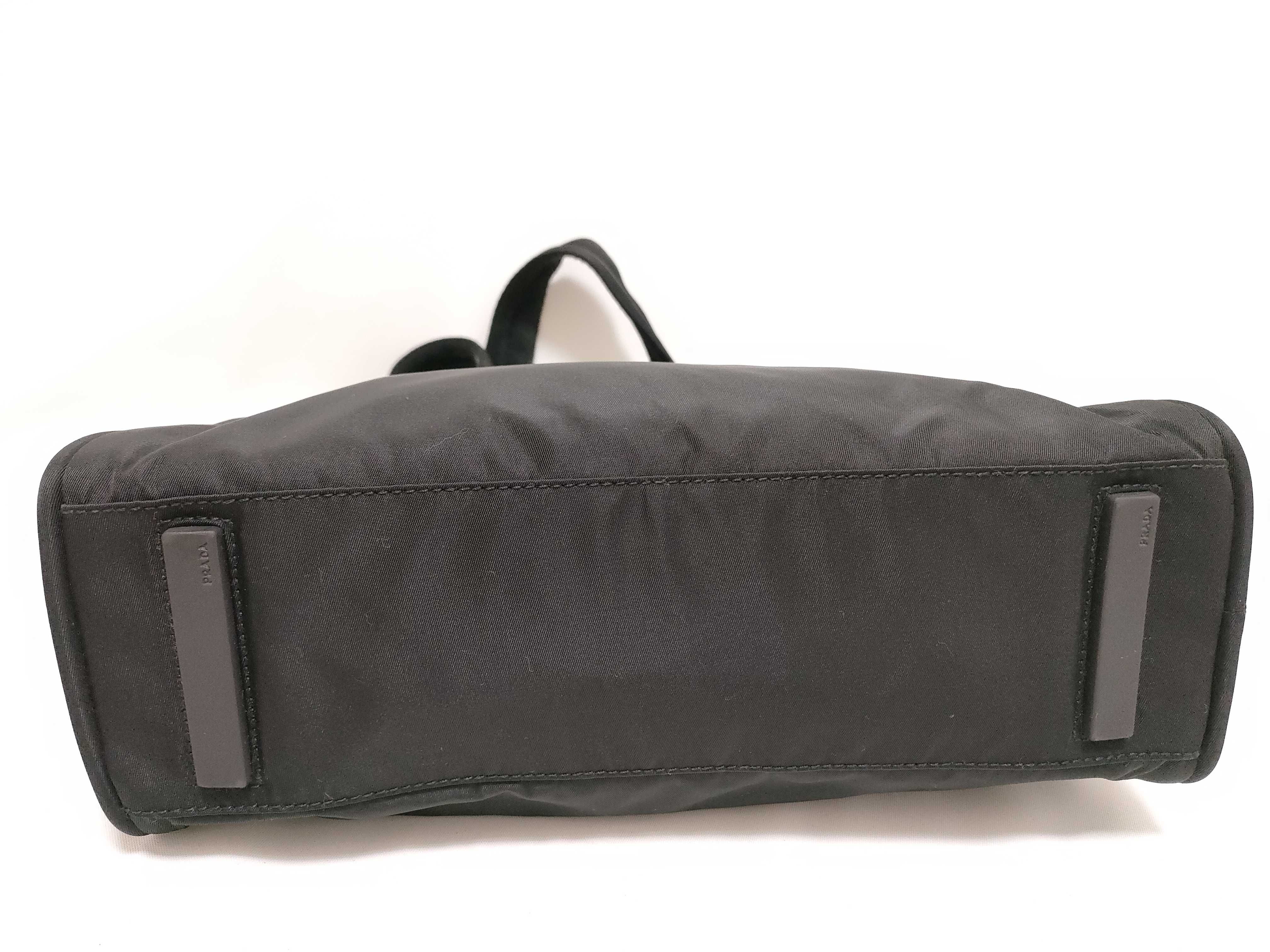 nylon handbag, black nylon, with clochette, guarantee card, and padlock. — view 8