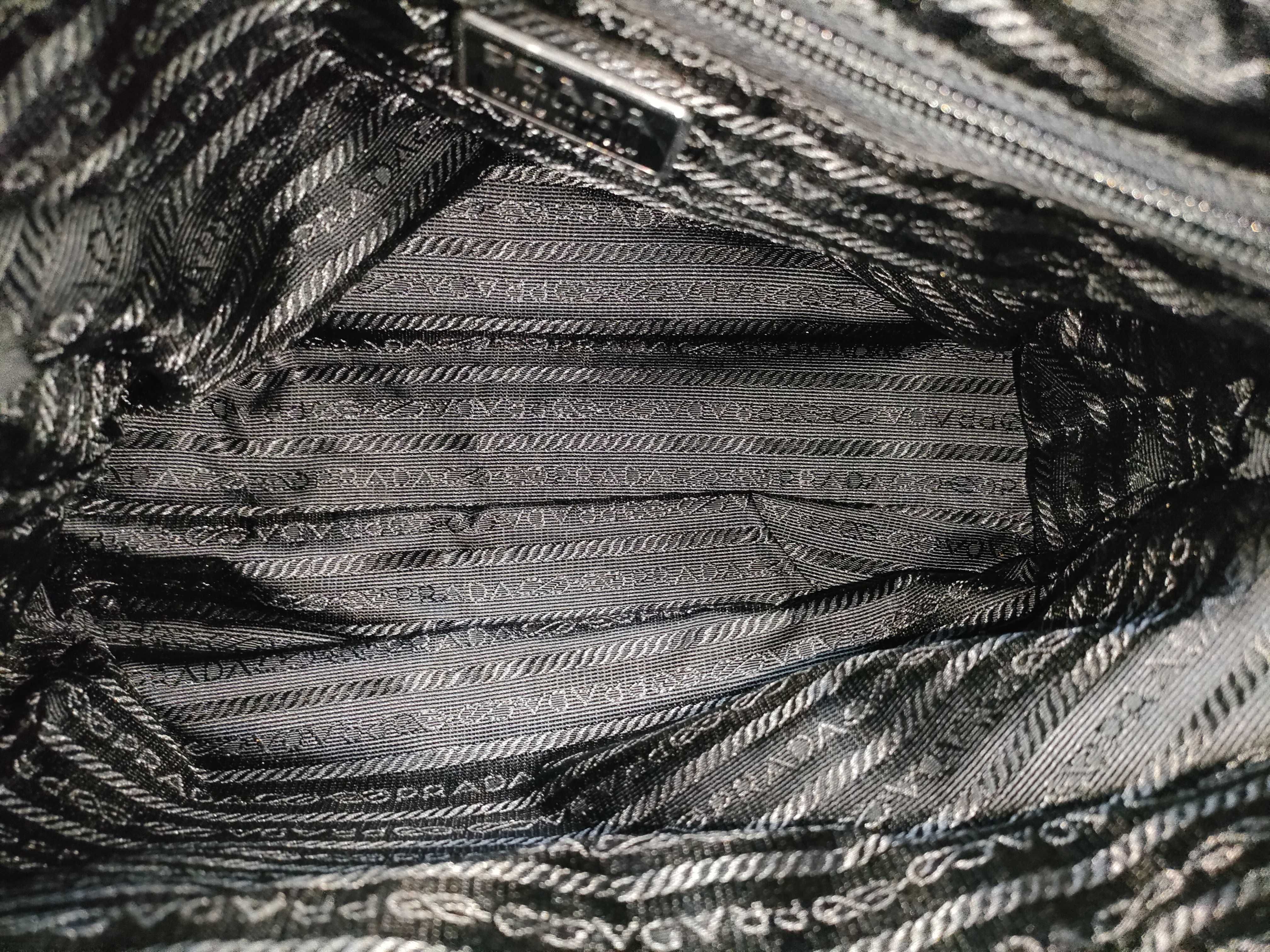 nylon handbag, black nylon, with clochette, guarantee card, and padlock. — view 10