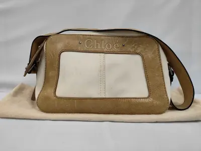 logo embossed leather shoulder bag