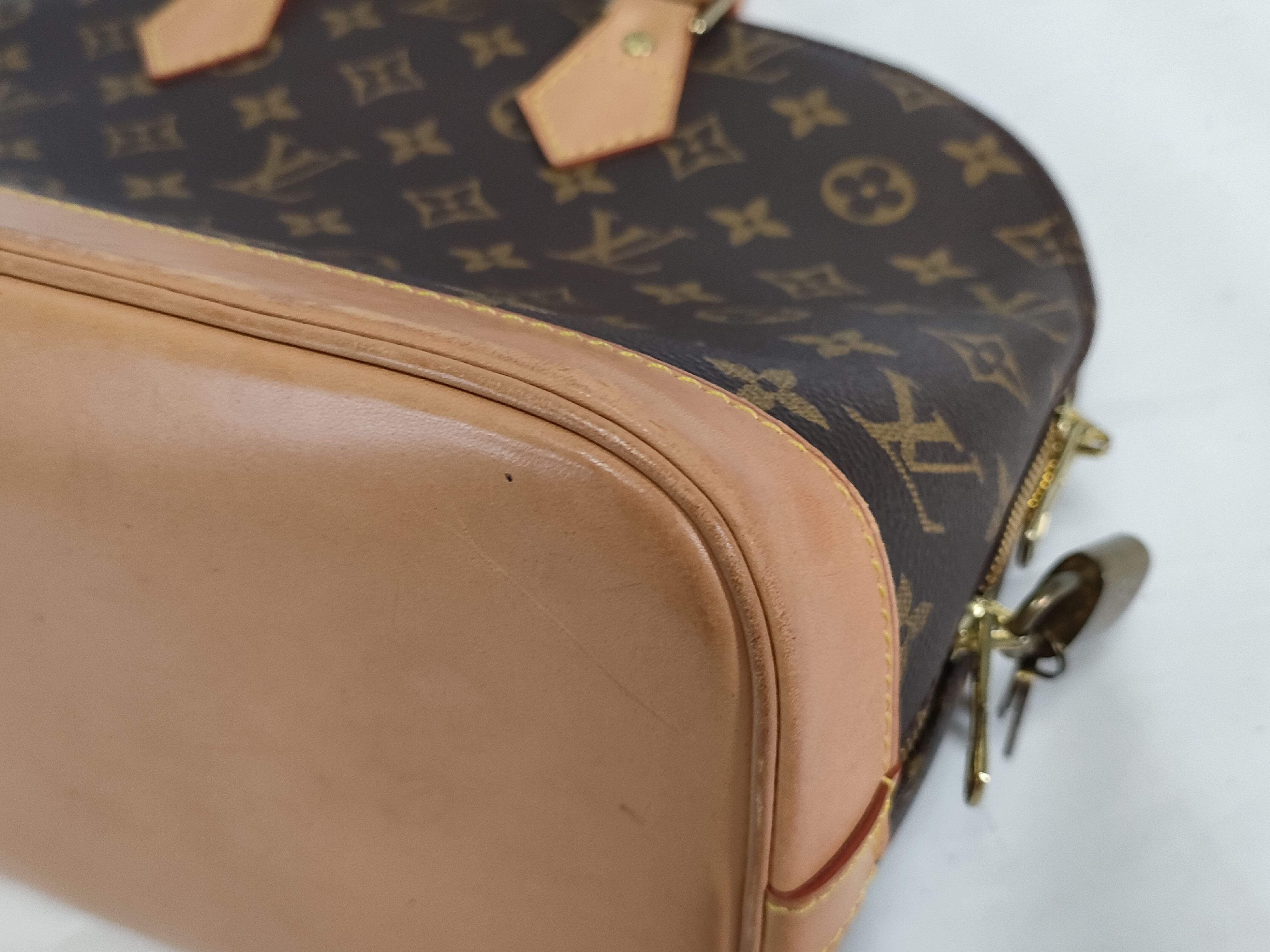 Monogram M40878 Alma MM Handbag — view 6