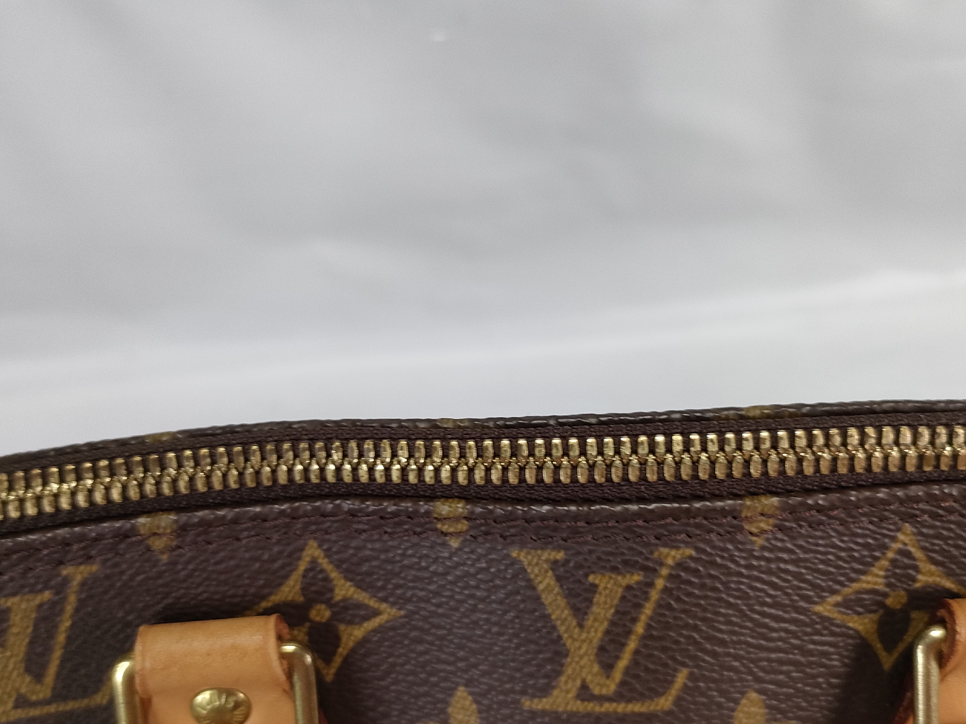 Monogram M40878 Alma MM Handbag — view 10