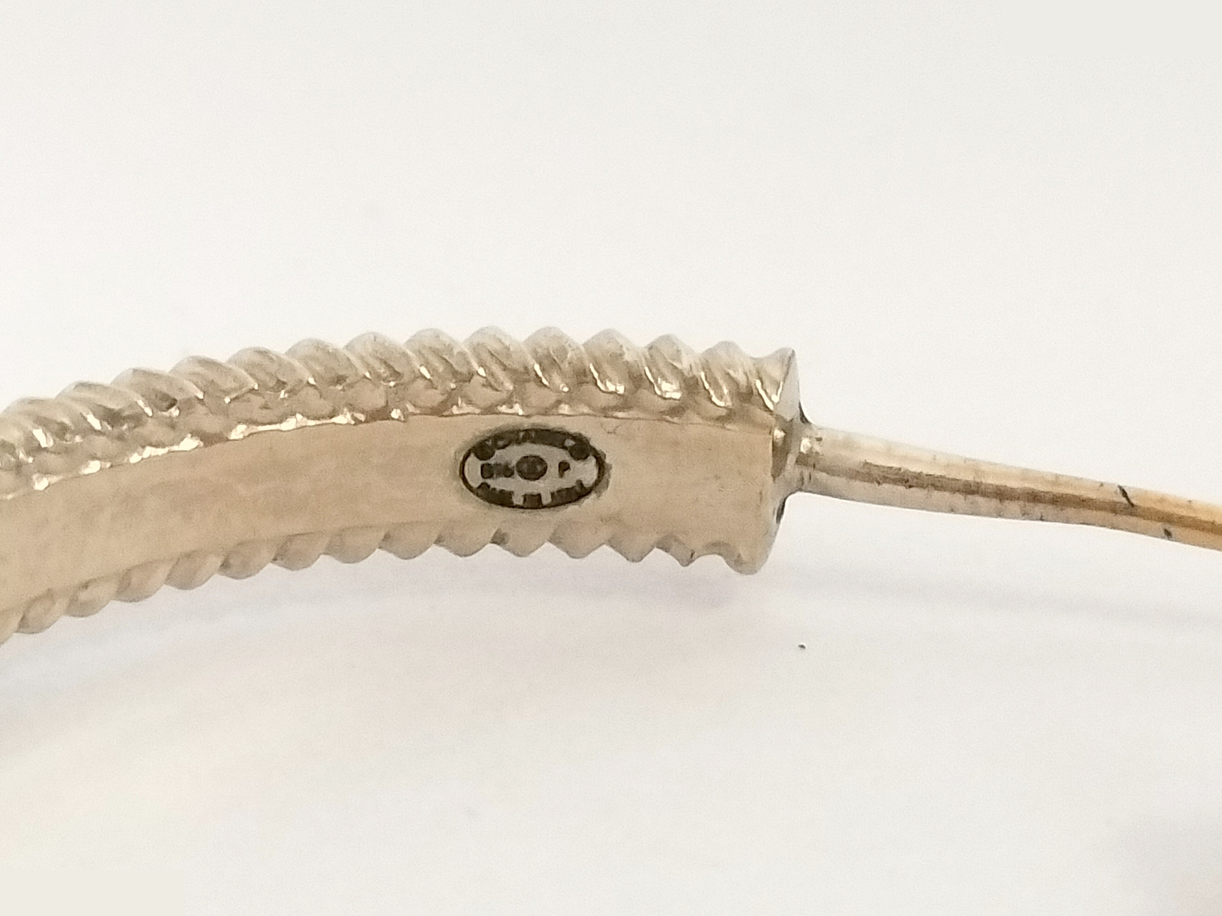 Coco gold earrings one side — view 3