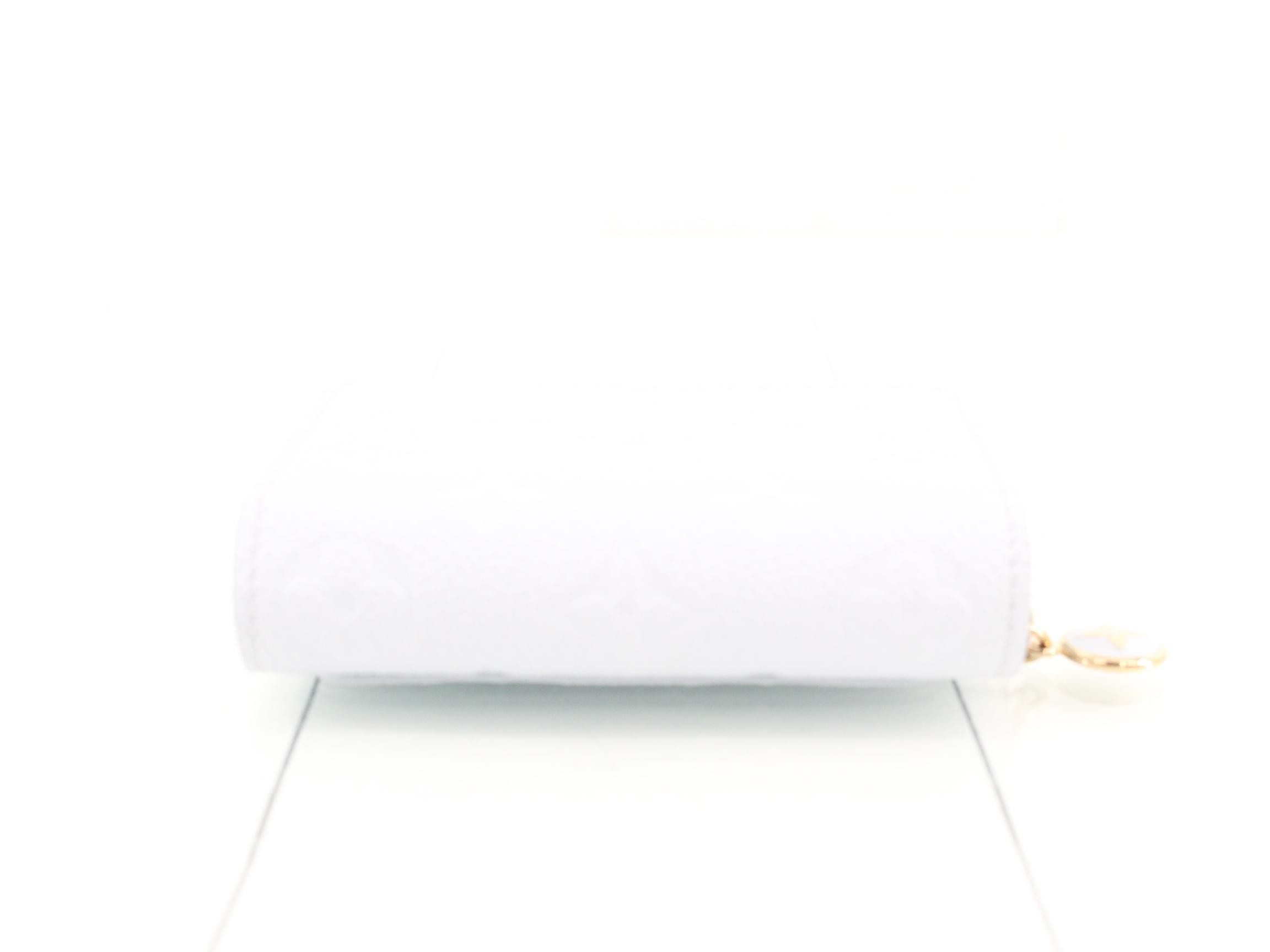 Monogram Empreinte Portefeuille Claire, unused, stored item. — view 3