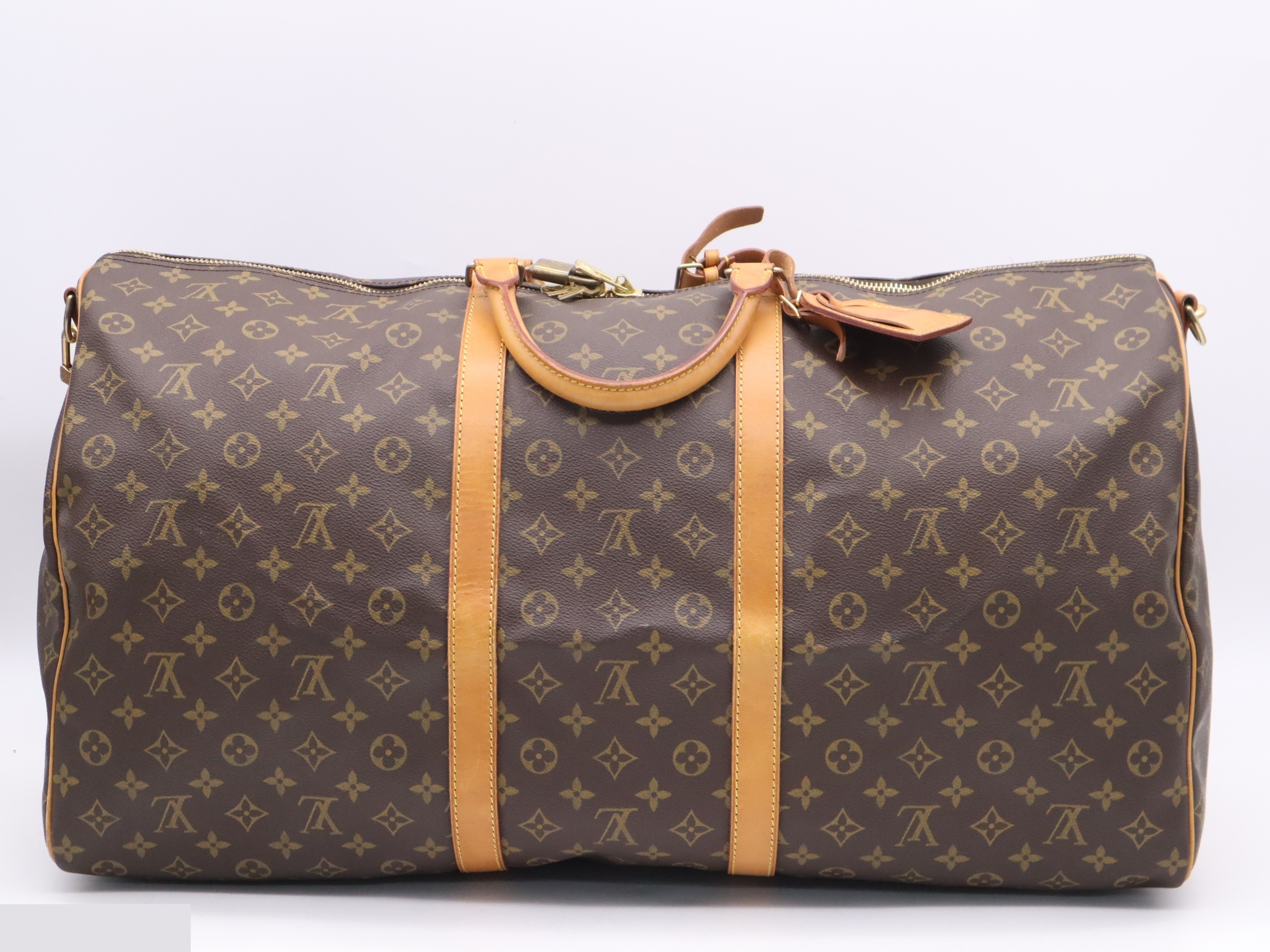 Keepall Bandouliere 60: Shoulder strap, padlock, 2 keys, name tag. — view 2