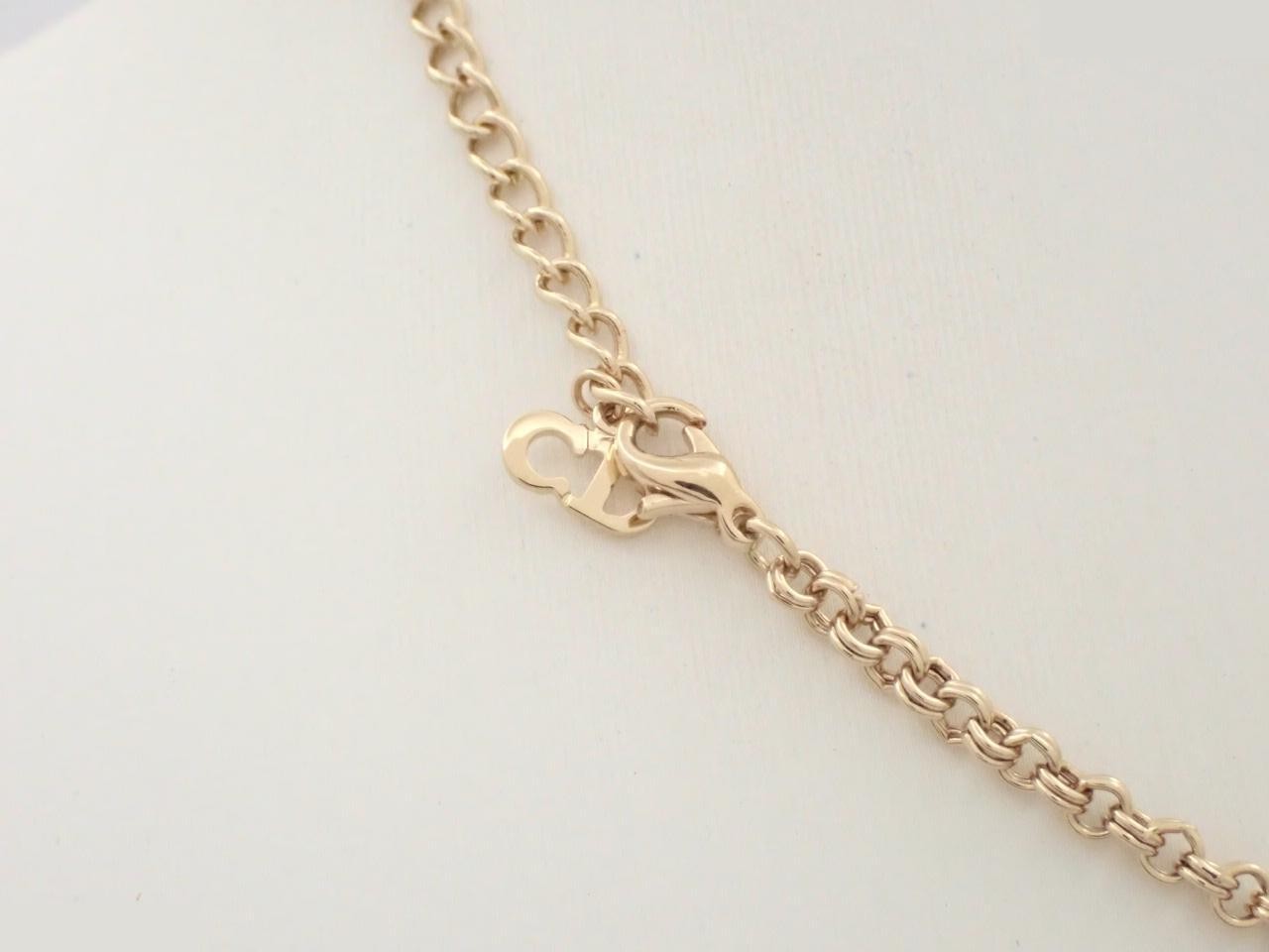 Gold-colored chain necklace, approximately 43cm in length. — view 2