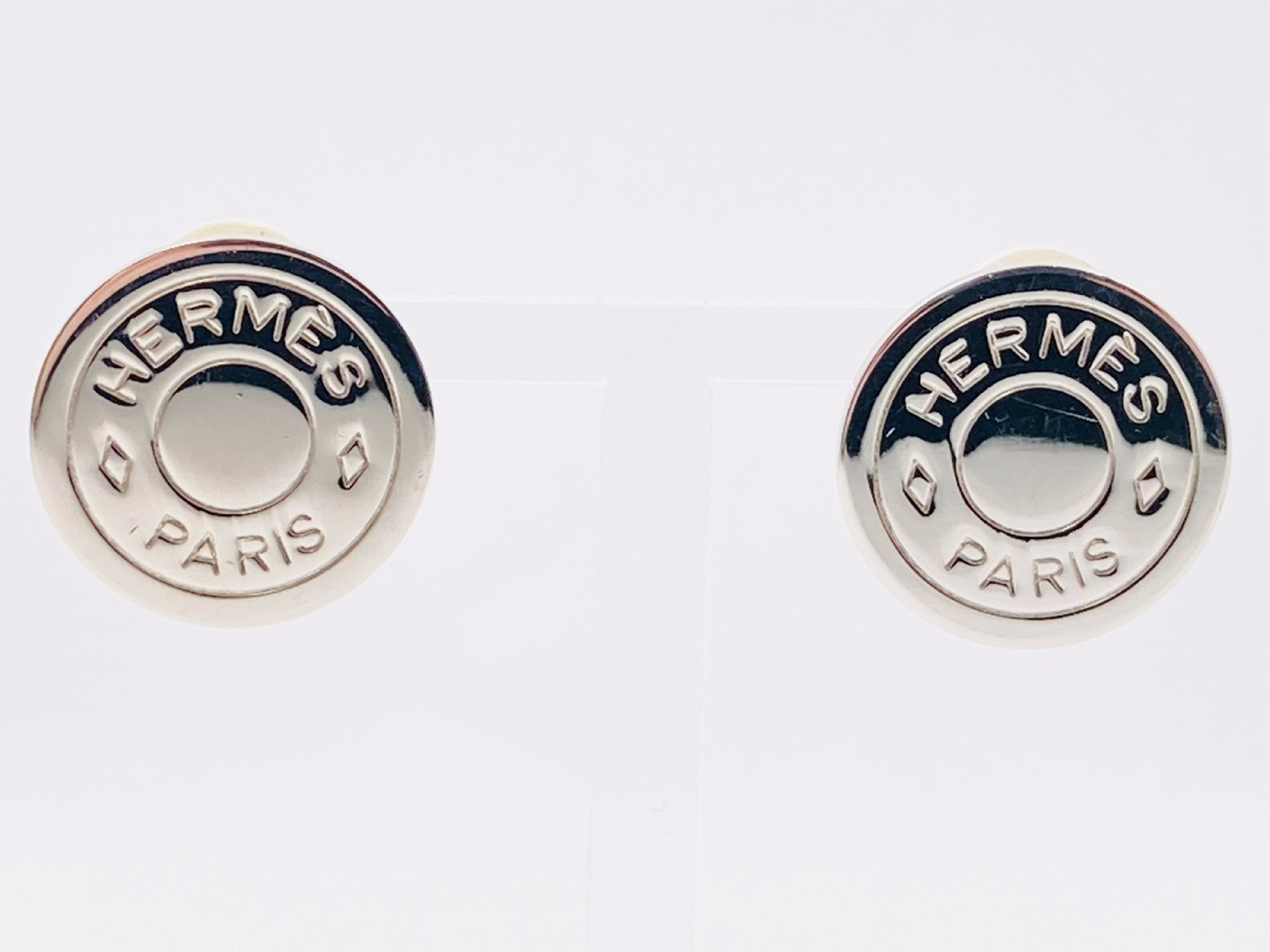 Sellier Round Metal Silver Earrings