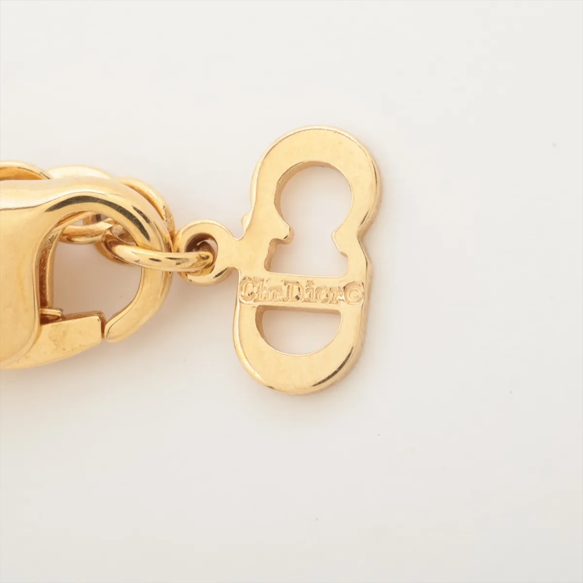 logo necklace, gold plated with rhinestones, shows signs of wear, tarnishing, — view 4