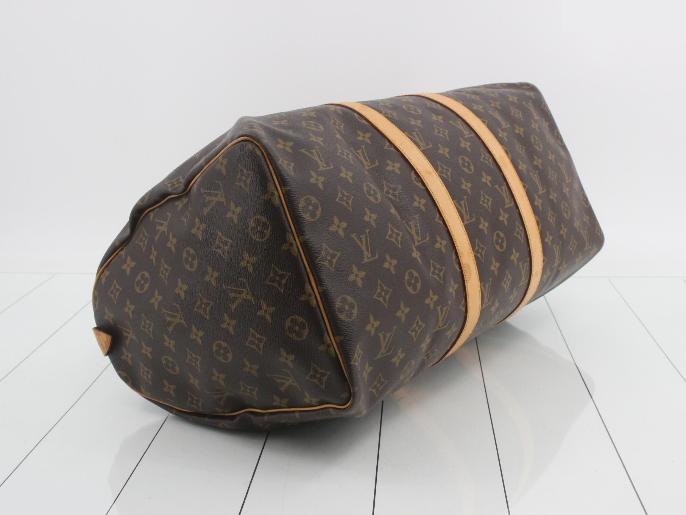 Keepall 50 with padlock, name tag, and handle strap. — view 5