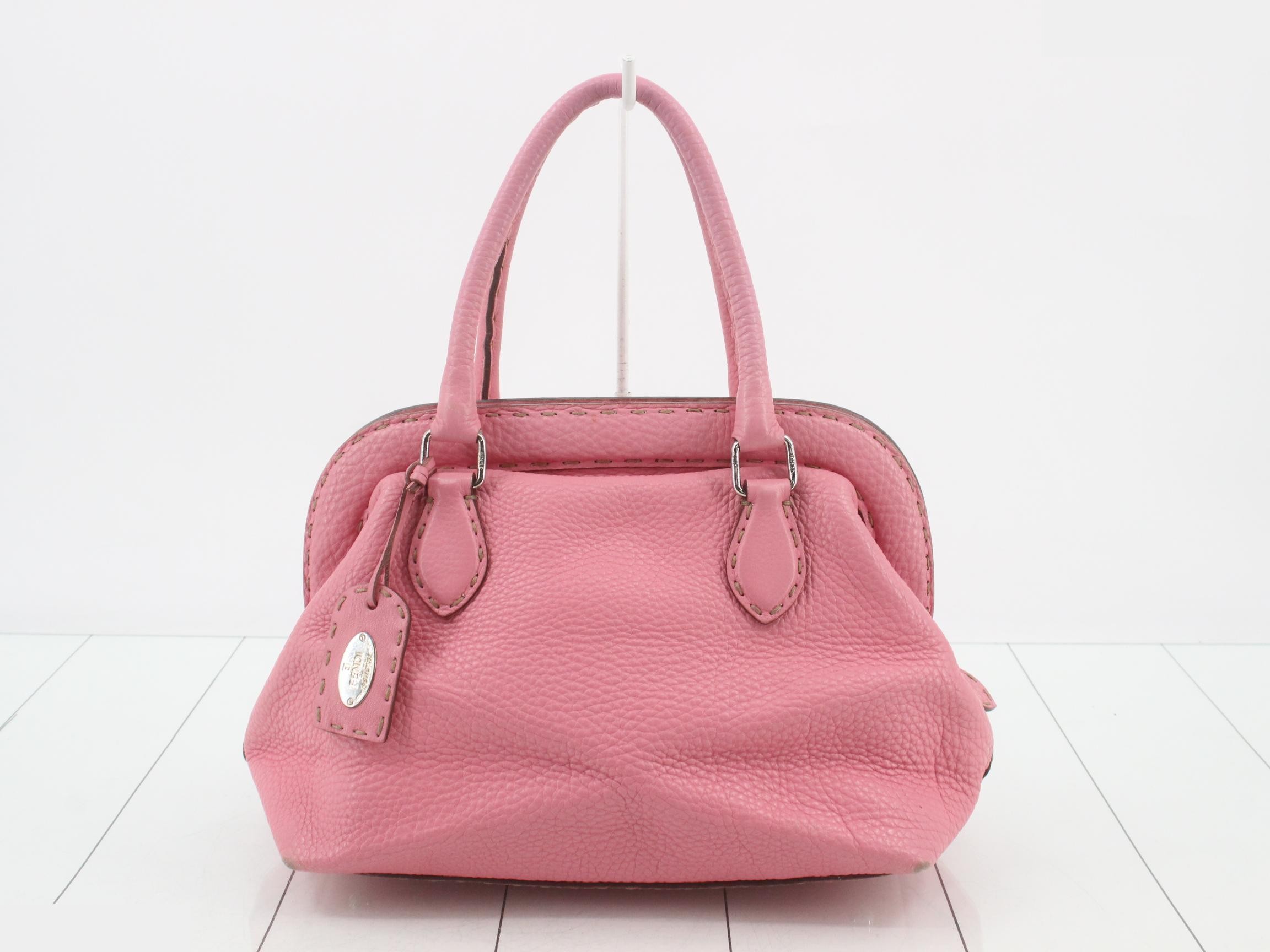 Pink leather handbag