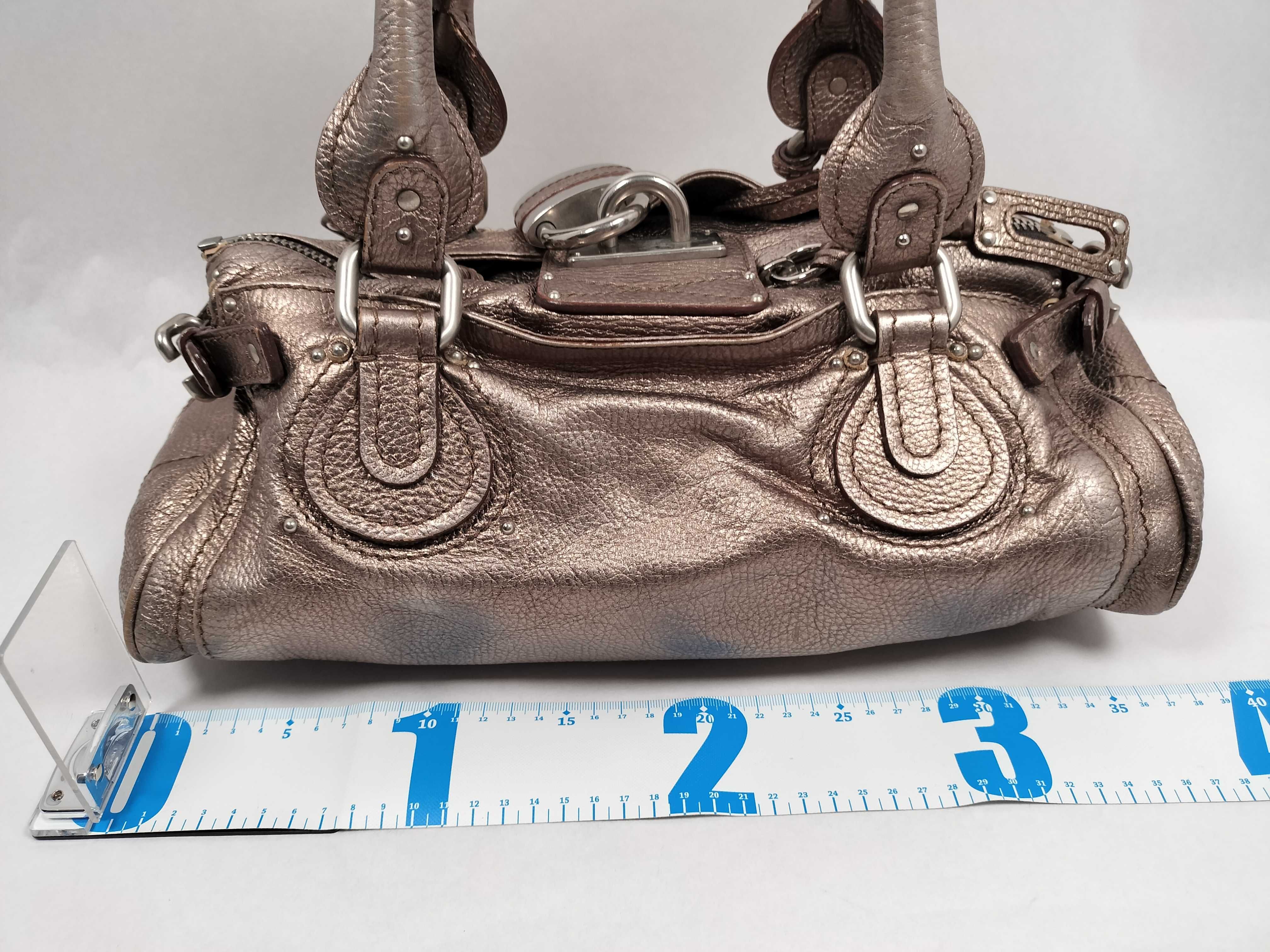 Paddington handbag, gold, includes padlock and key. — view 2