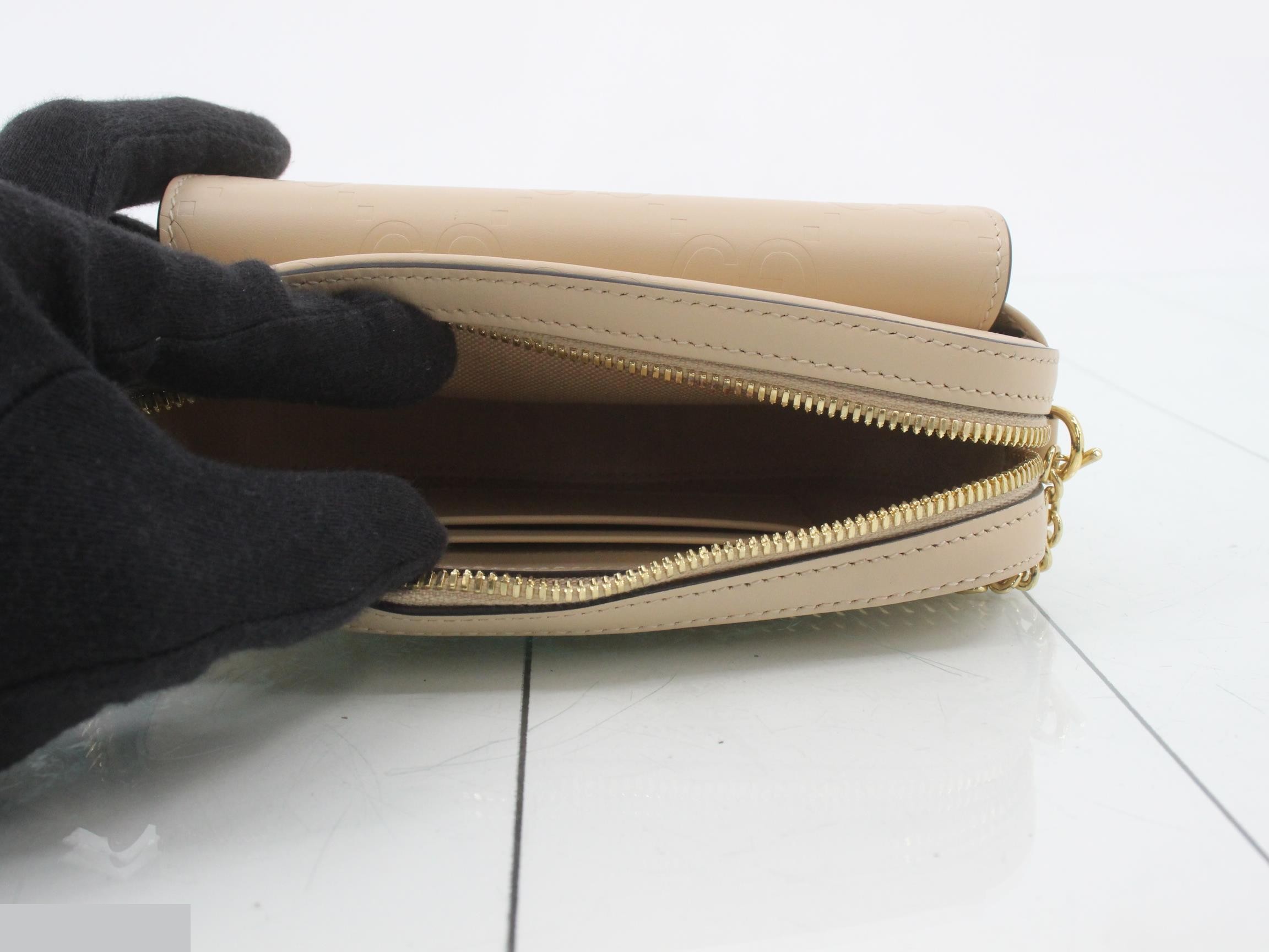 GG Embossed Shoulder Bag — view 4