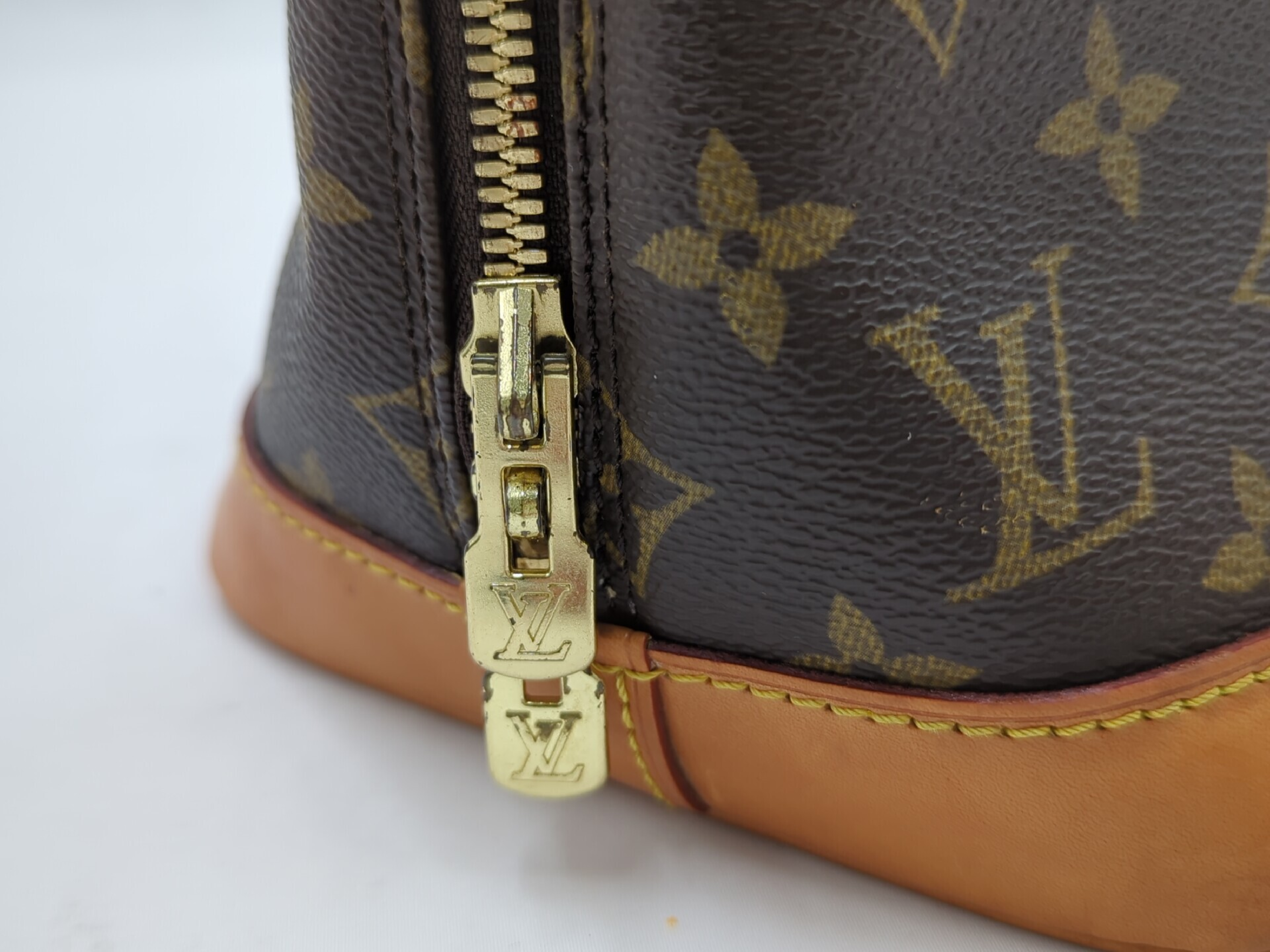 M51130 Monogram Alma Handbag — view 9
