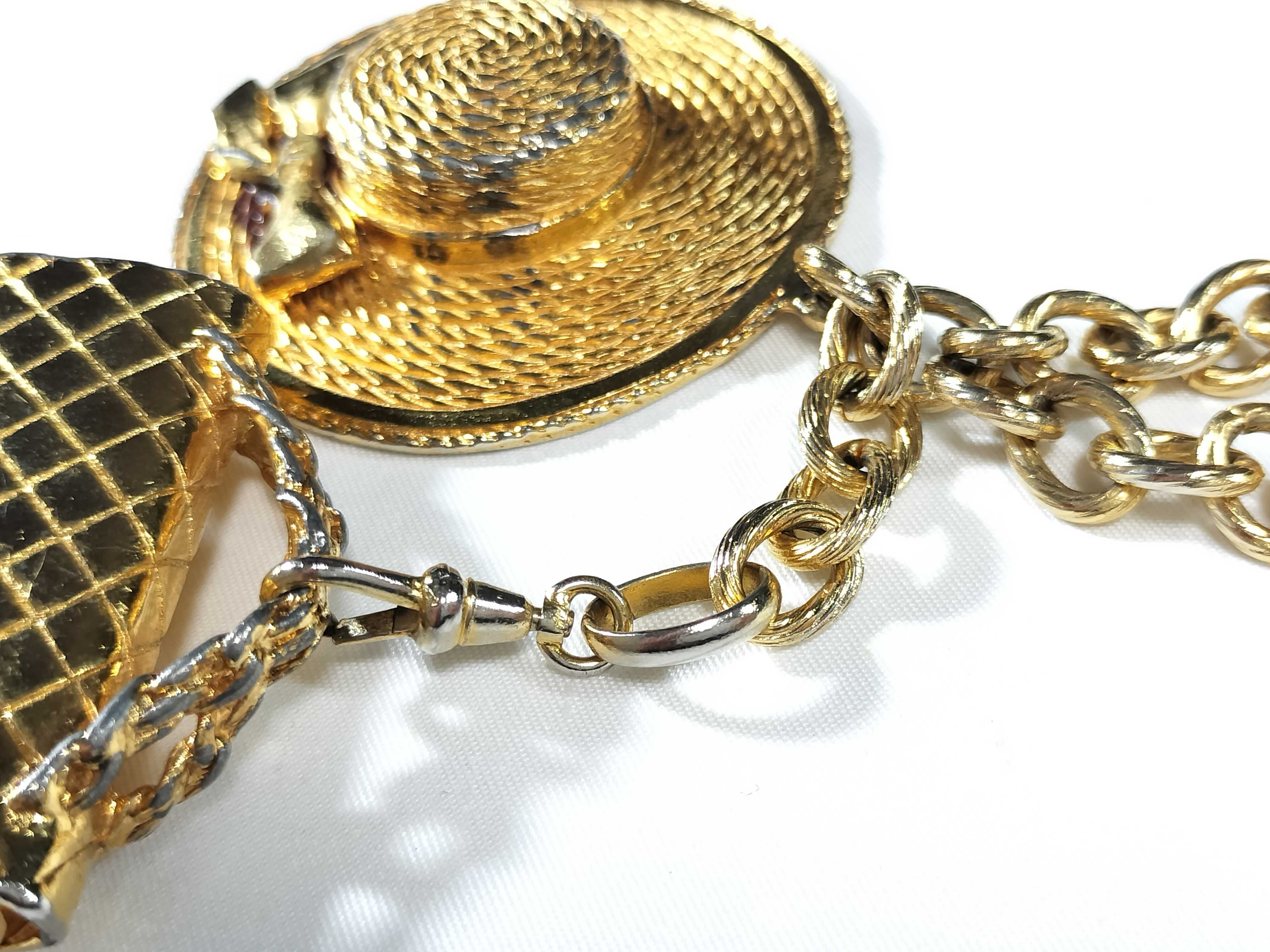 Matelassé bag, hat motif chain necklace, gold, and other accessories. — view 11
